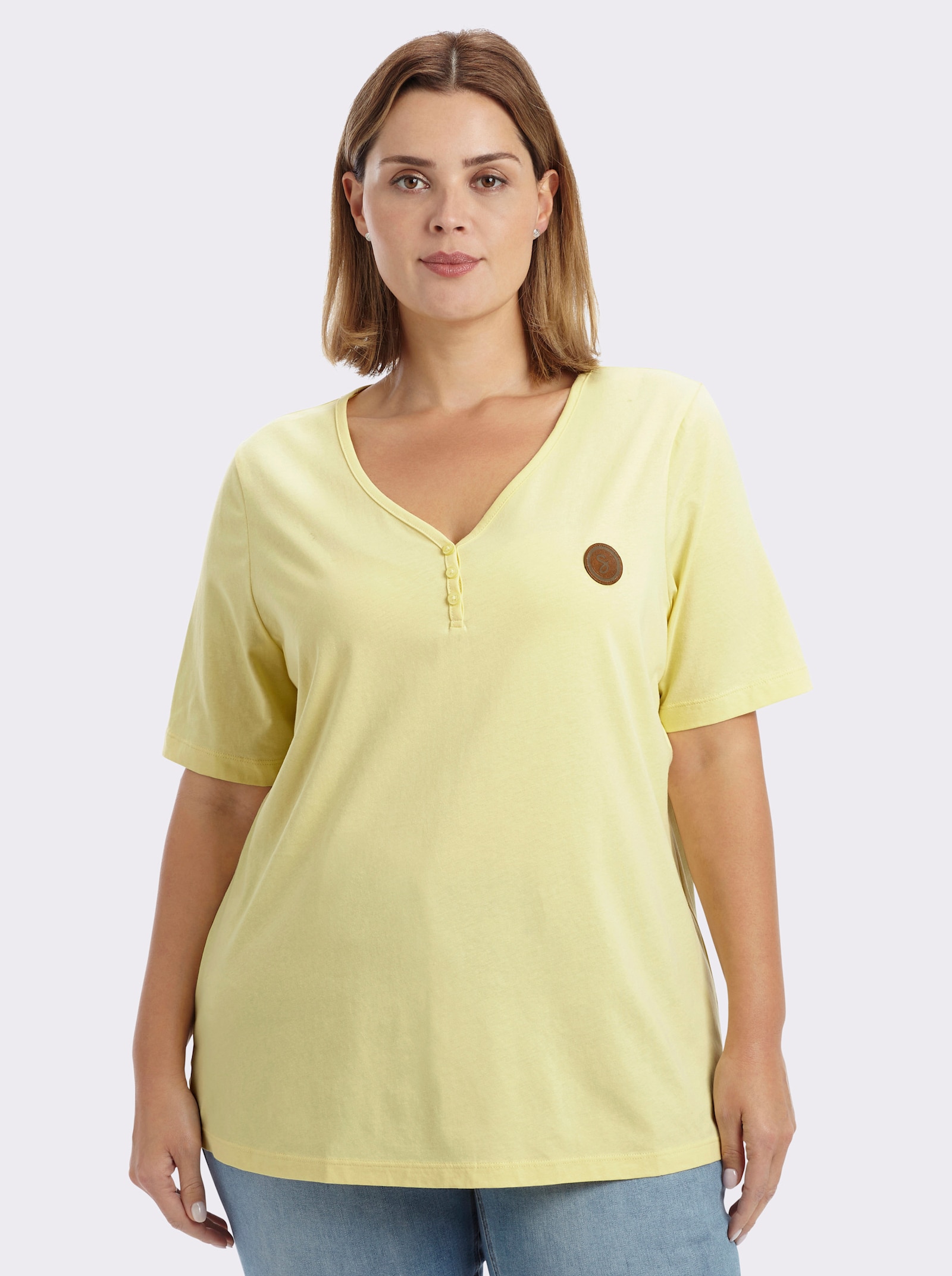 sheego Shirt met V-hals en korte sierknoopsluiting - citroen