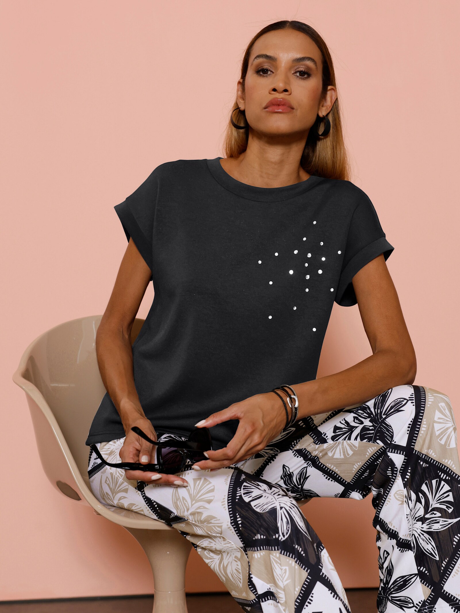 Sweatshirt mit Glitzersteinchen-Verzierung - schwarz
