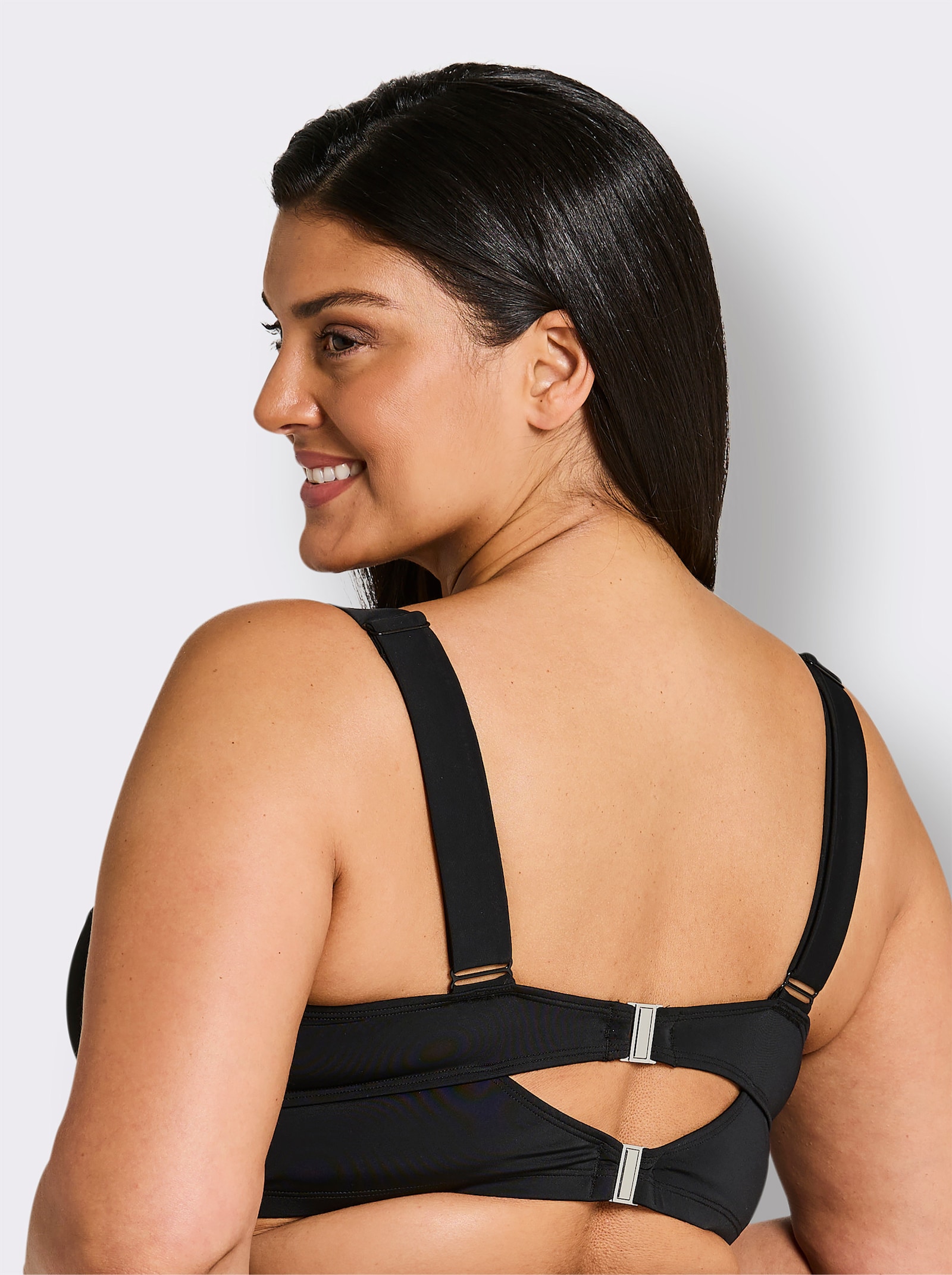 sheego Bikini-Oberteil mit Mesh-Volants und Zierschleife - schwarz