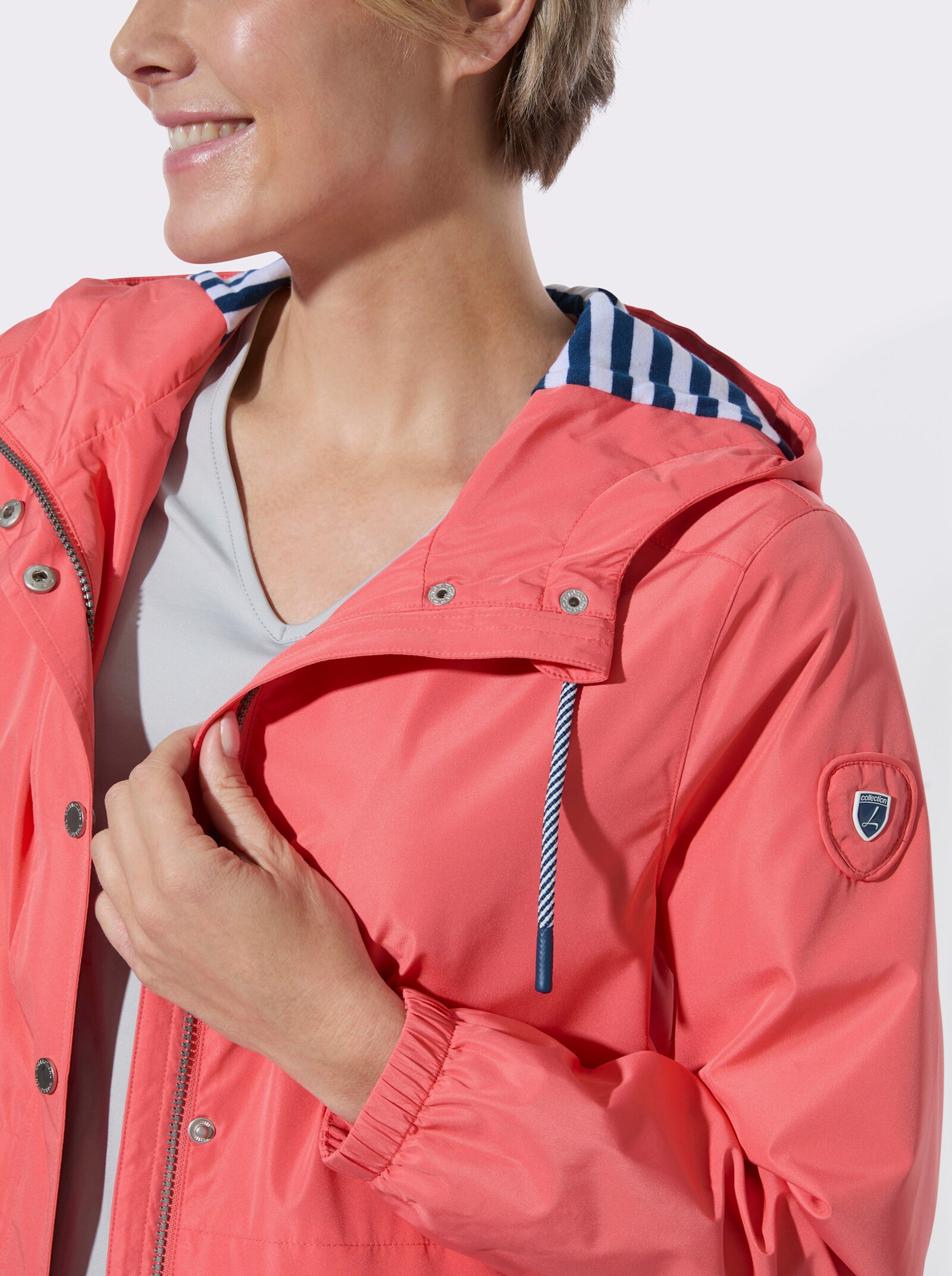 Übergangsjacke mit Kapuze - koralle