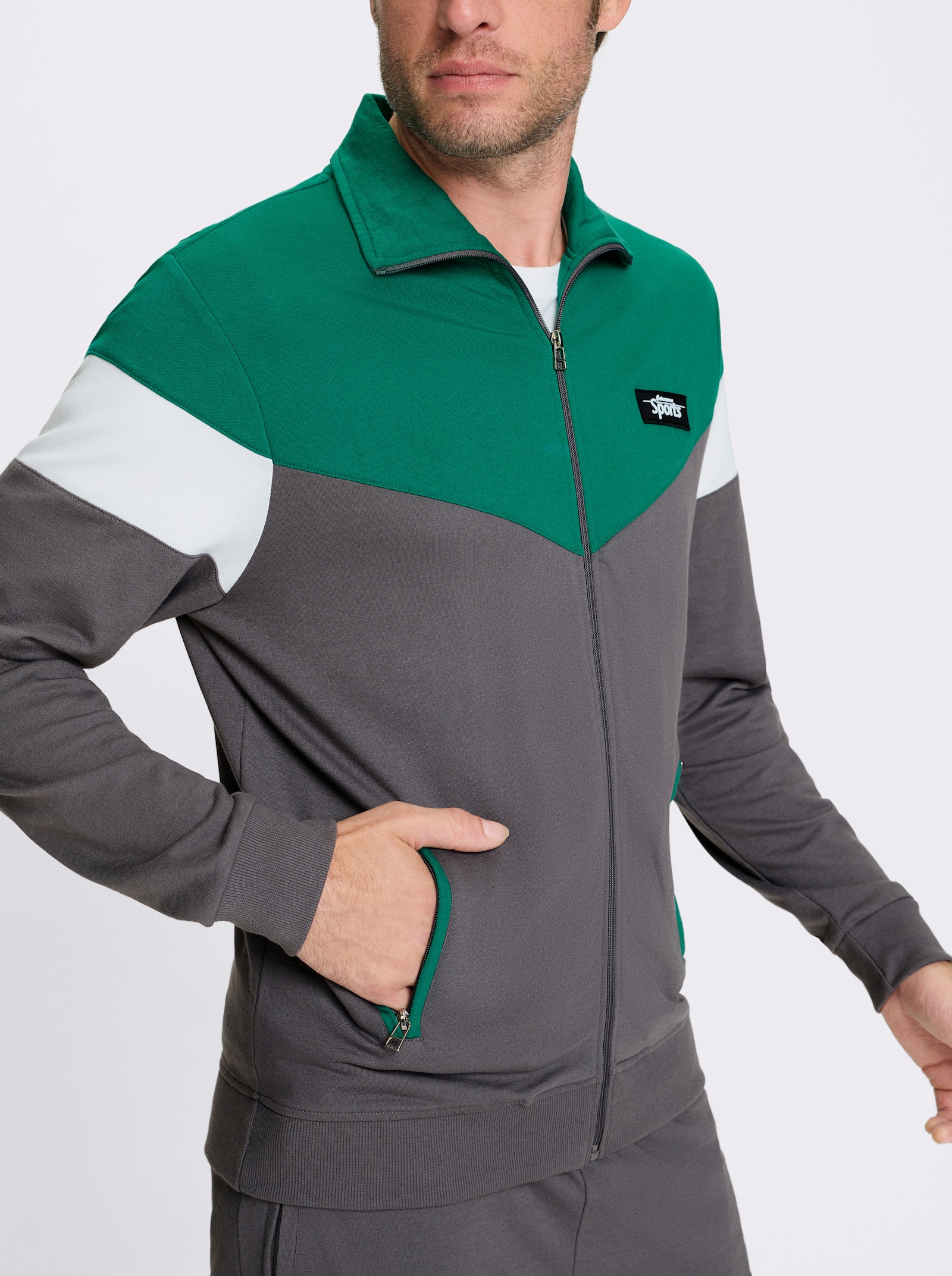 Catamaran Sports Freizeitanzug mit Reißverschluss-Taschen - grün