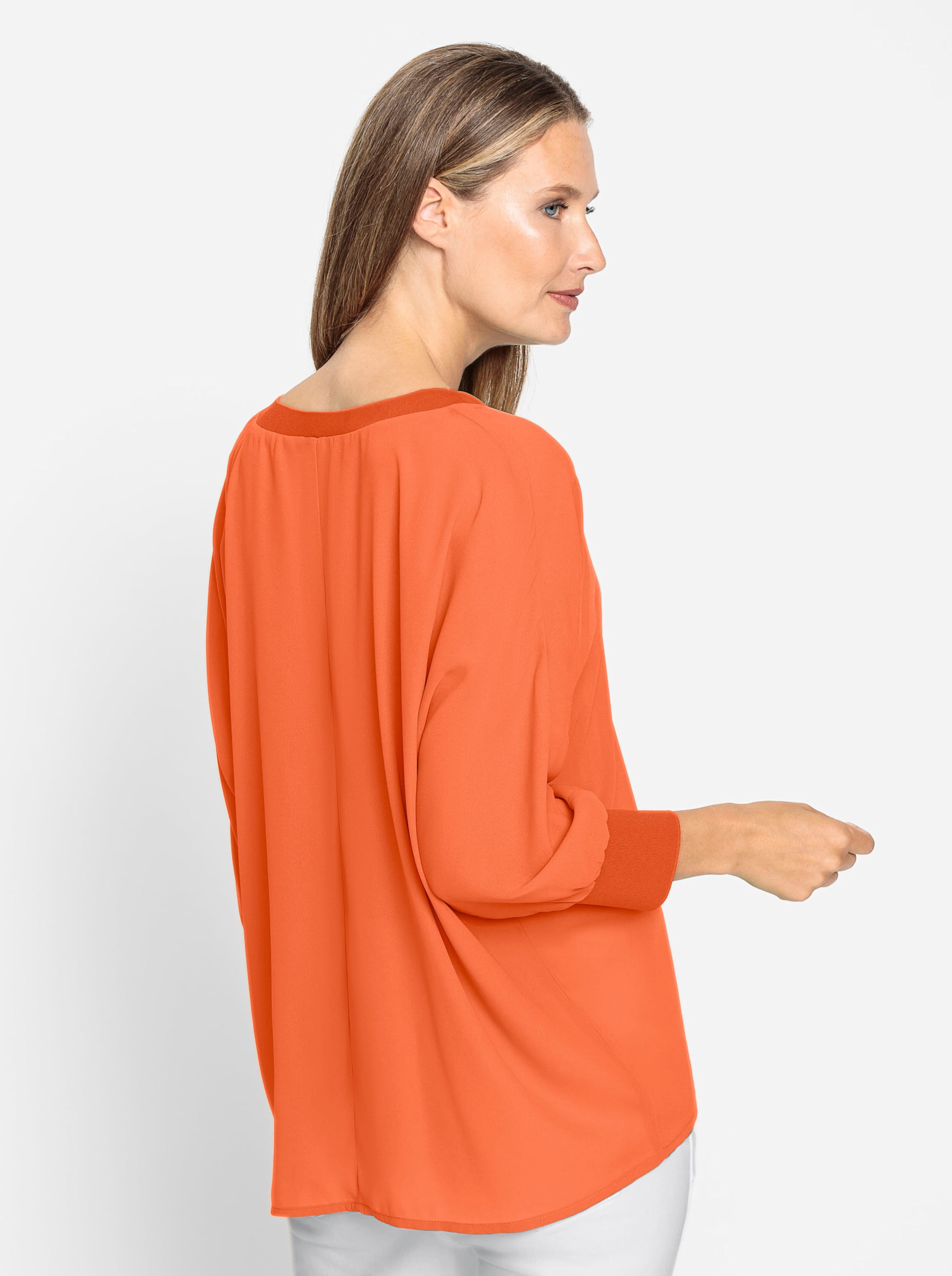 Moderner günstig Kaufen-Bluse in orange von heine. Bluse in orange von heine <![CDATA[Bluse Lässig geschnittener Style in leicht transparenter Crêpe-Qualität. Moderner V-Ausschnitt mit breiten Bündchen. Fledermaus-Ärmel mit Ripp-Optik am Abschluss.]]>. 