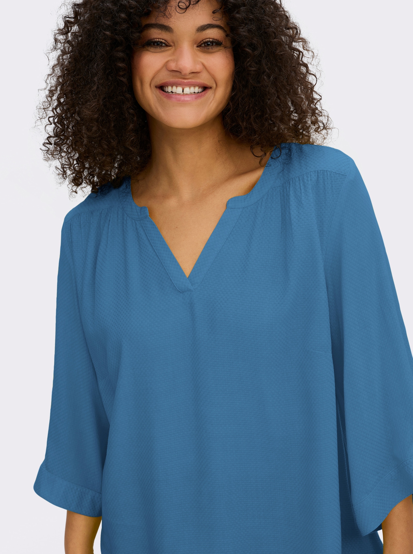 sheego Tunika mit Rundhalsausschnitt und V-Schlitz - topas