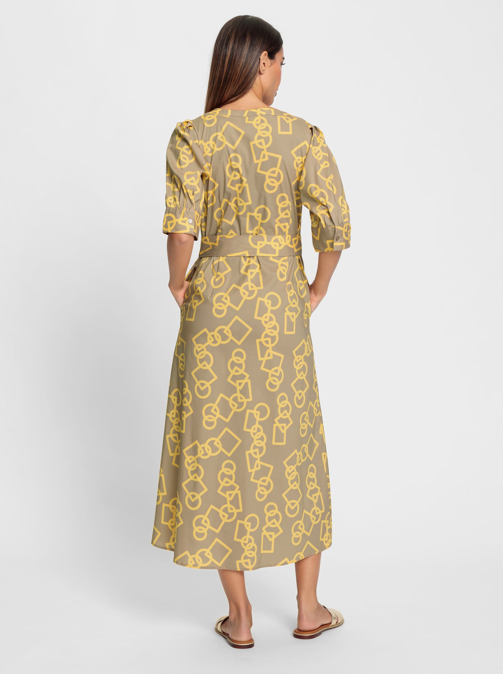 heine Wikkeljurk met pofmouwen - sesam/geel bedrukt