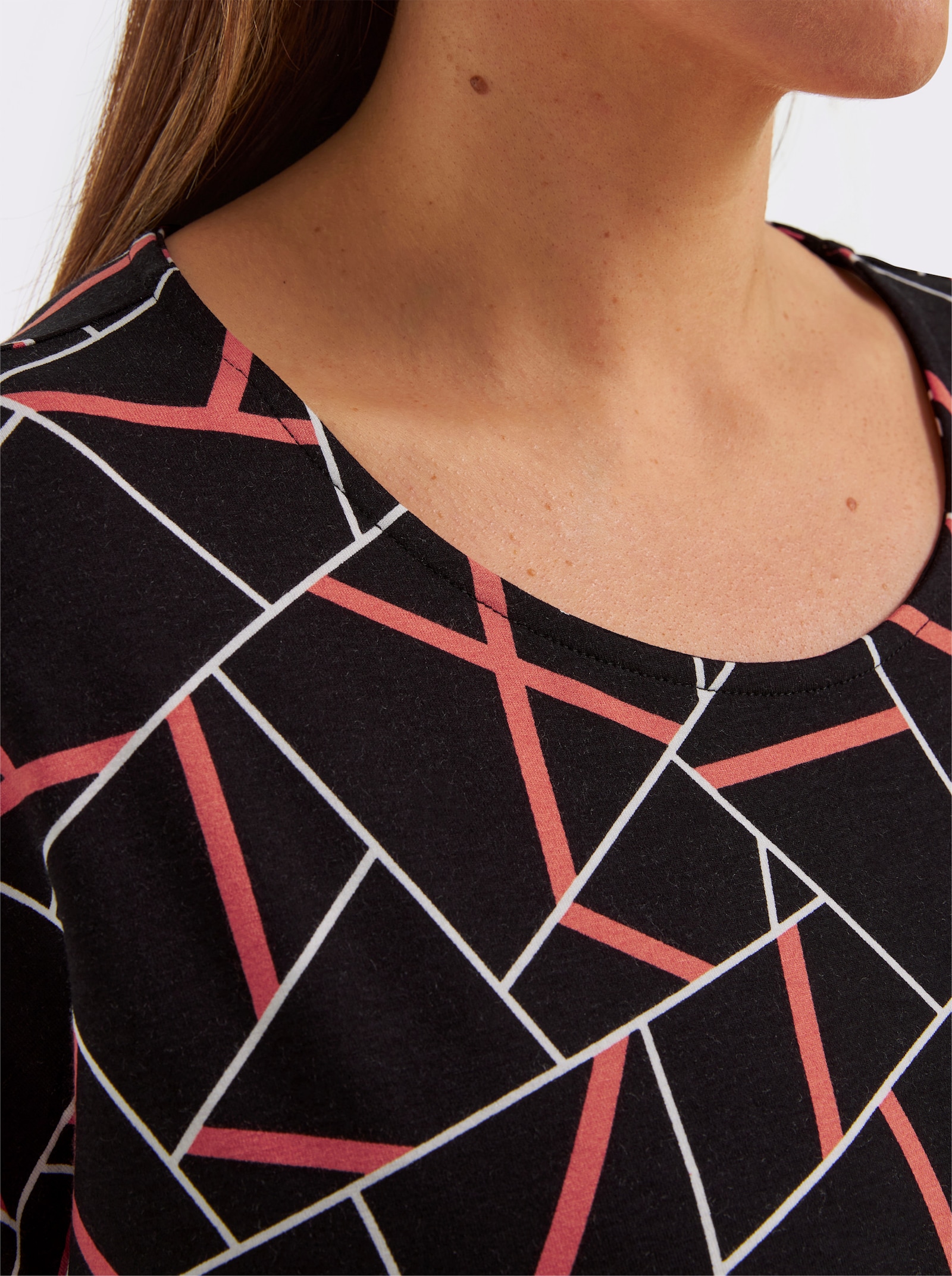 Kurzarmshirt mit grafischem Dessin - schwarz-papaya