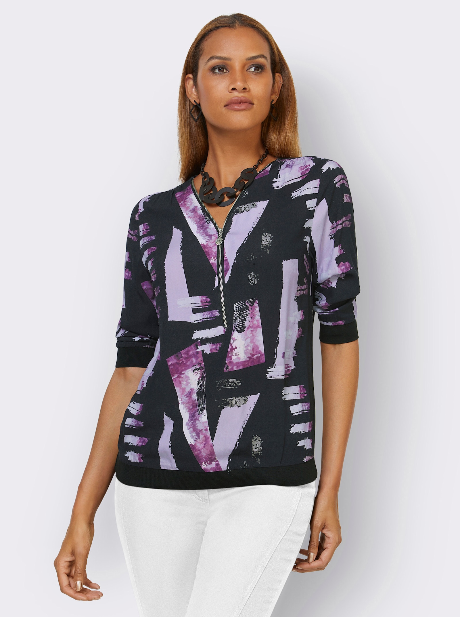 Druckbluse mit Reißverschluss - schwarz-flieder-bedruckt