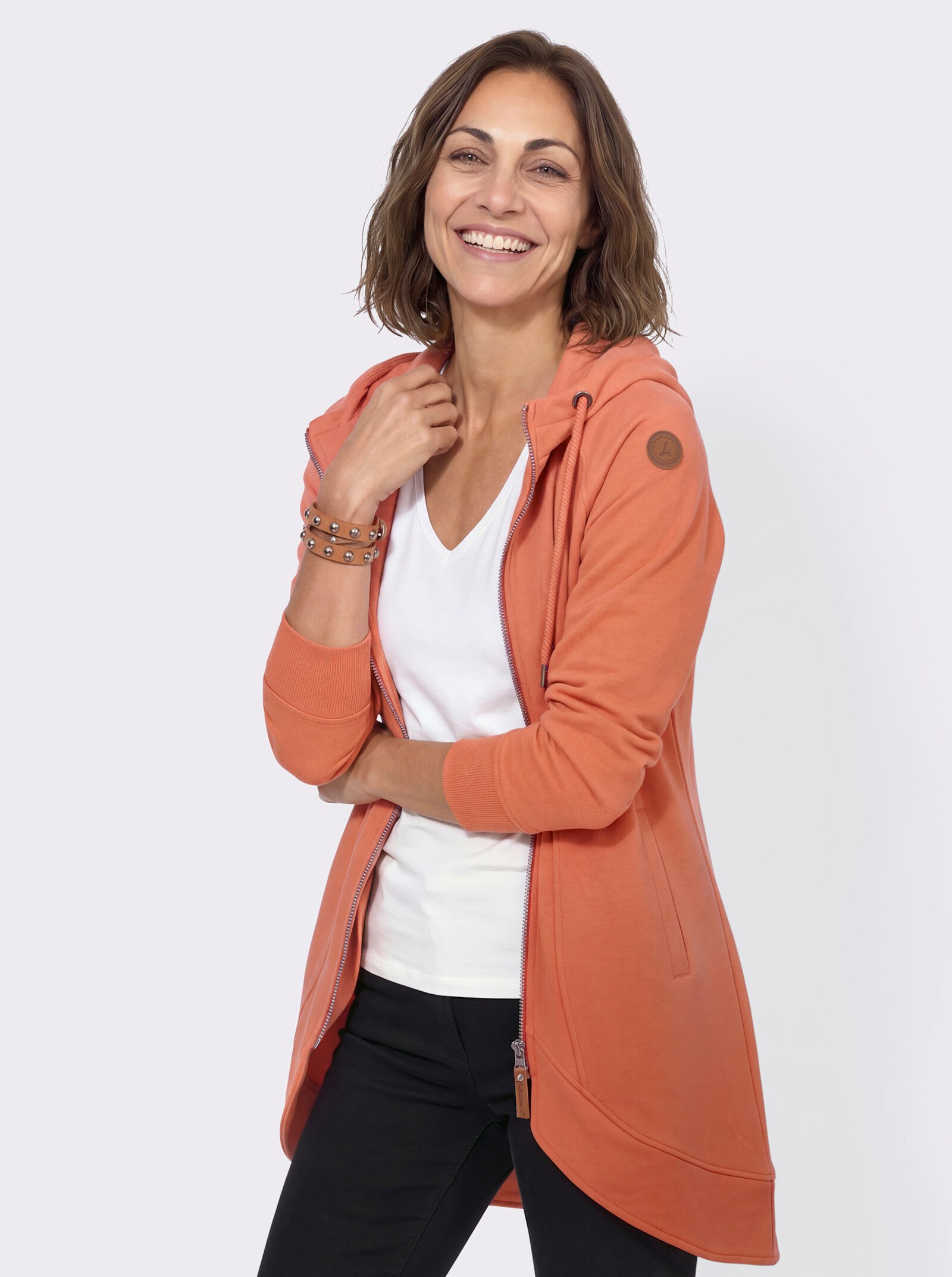 Sweatjacke mit Leistentaschen - papaya