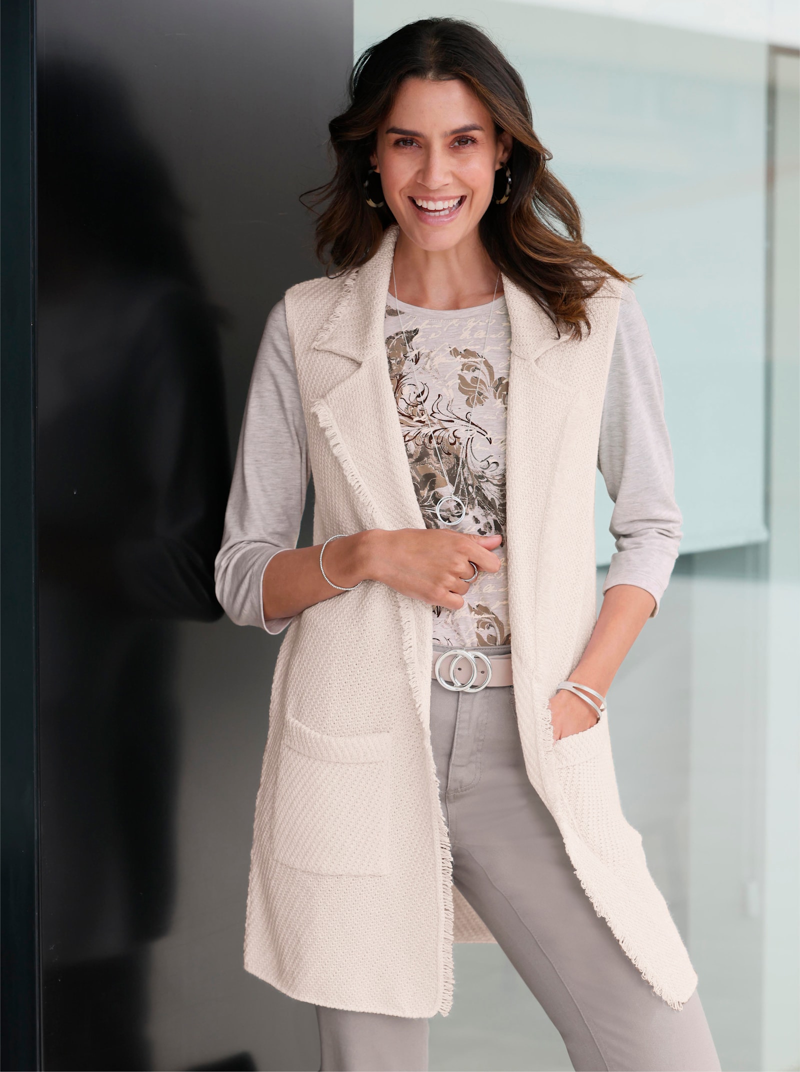 Strickweste mit Fransen - elfenbein-weiß-meliert