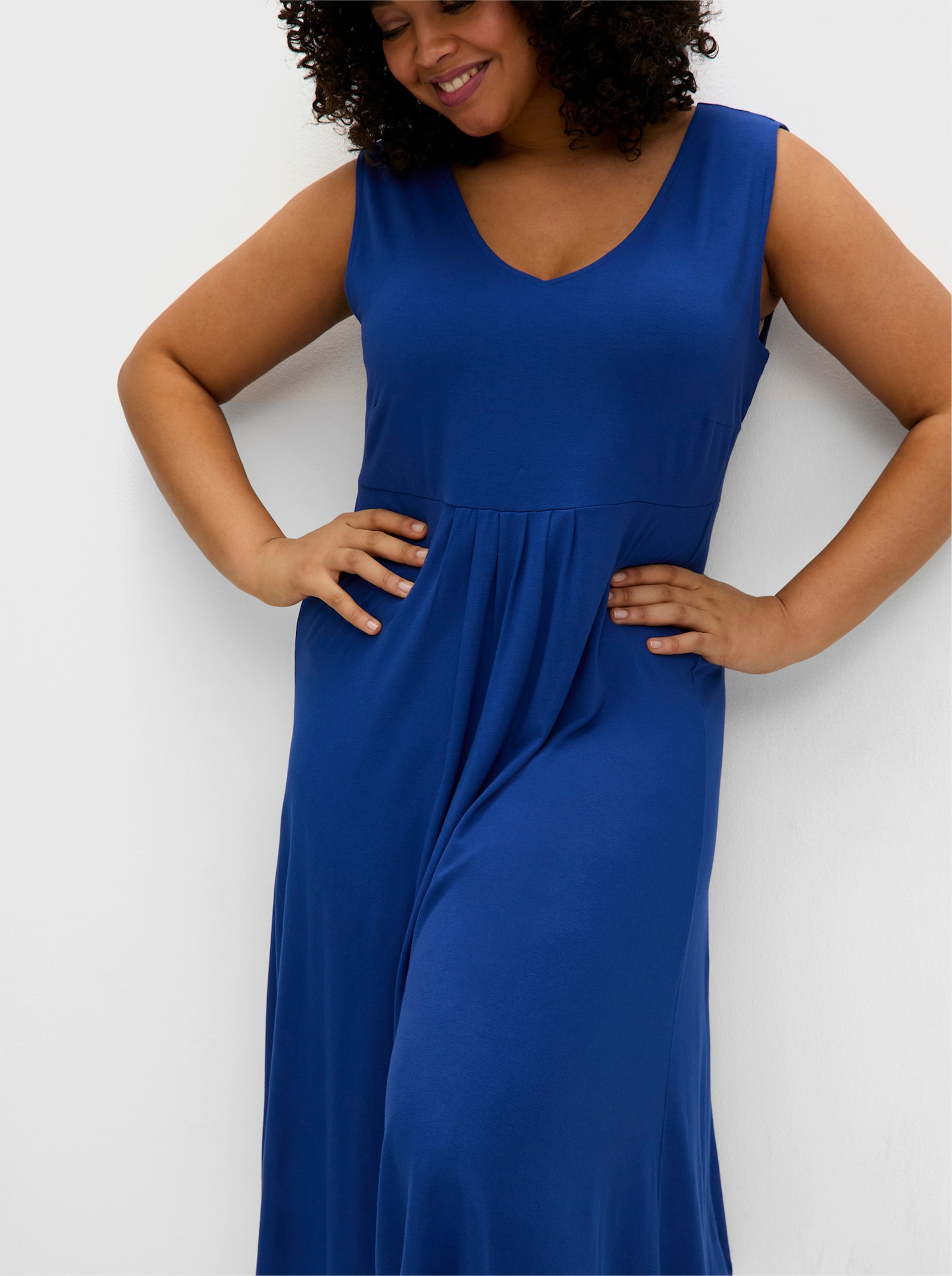 sheego Jerseyjurk met rimpeling voor, mouwloos - bosbes