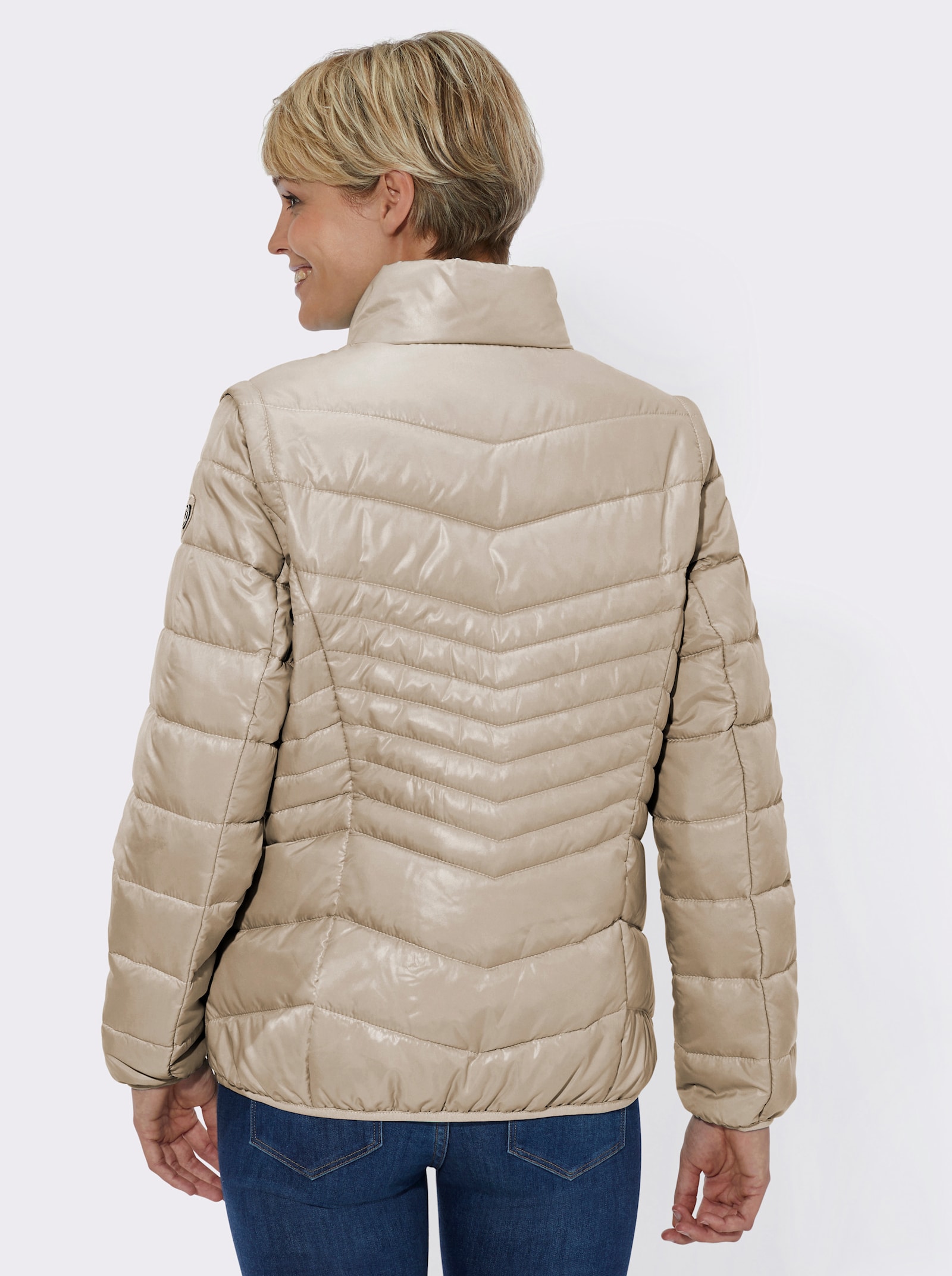 Veste matelassée aux manches amovibles - beige