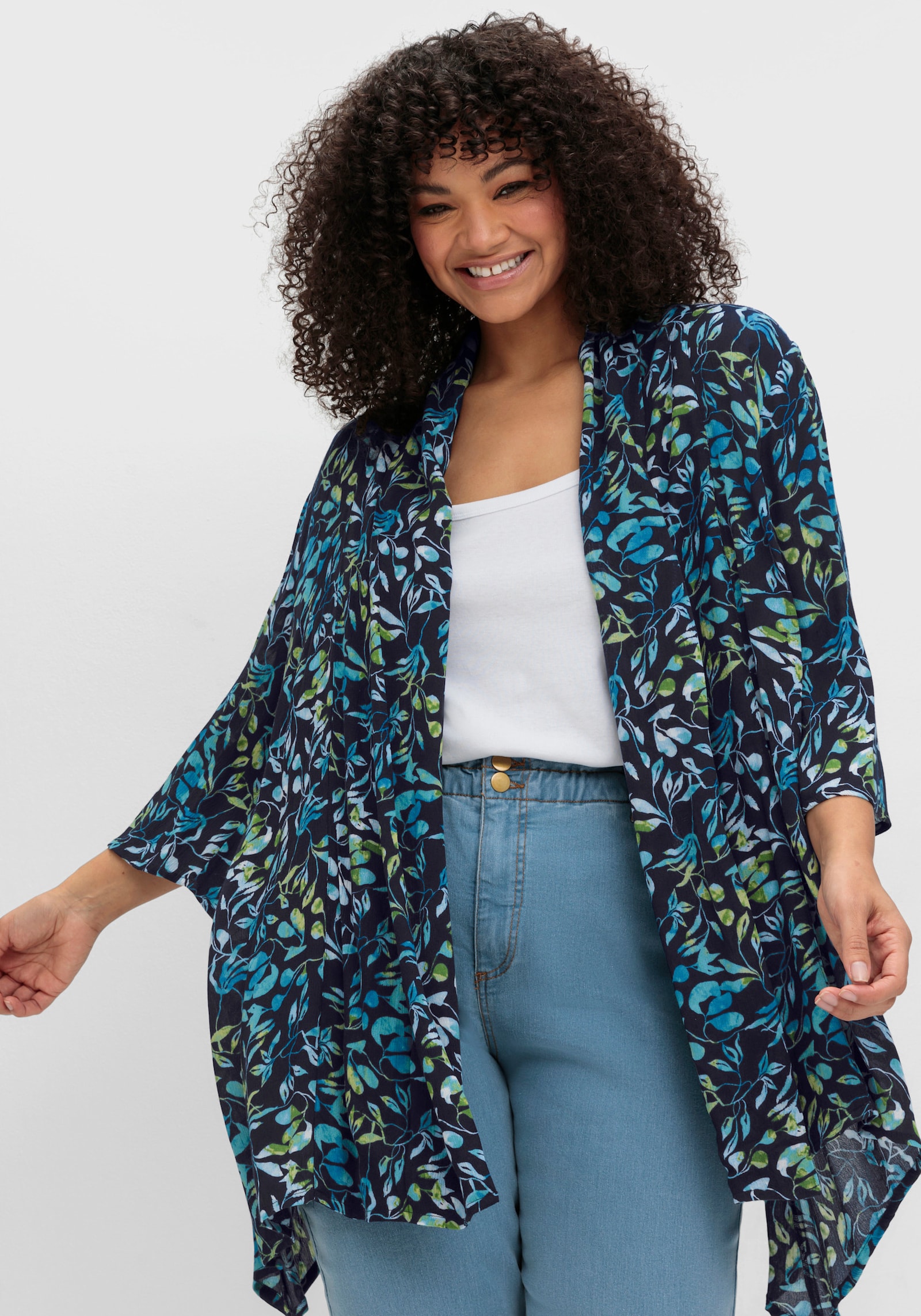 sheego Longbluse mit Blätterdruck, in Zipfelform - tiefblau-bedruckt