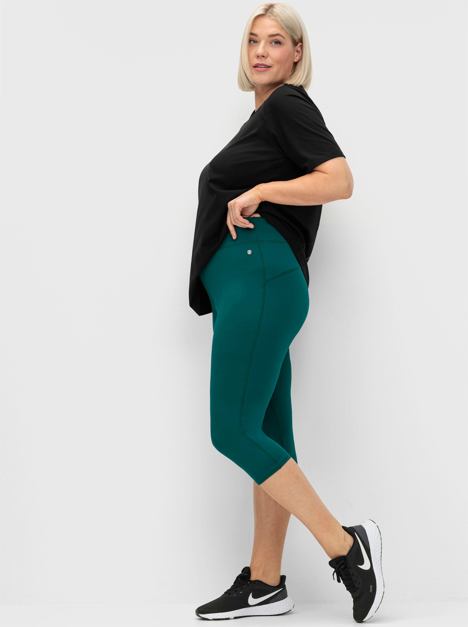 sheego Functionele tight in caprilengte - petrol