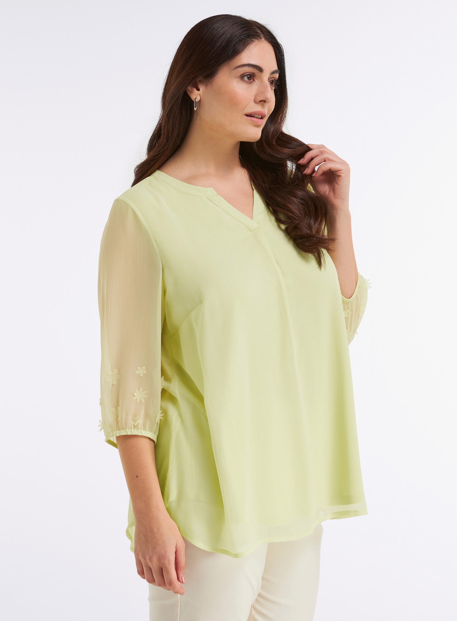 sheego Tunika mit Blüten-Applikationen am Ärmel - pistazie