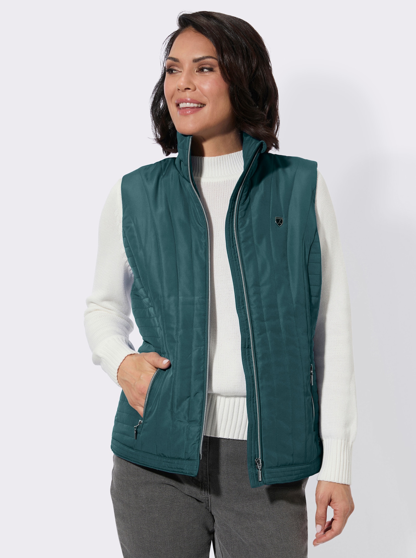 Steppweste mit Zippertaschen - petrol