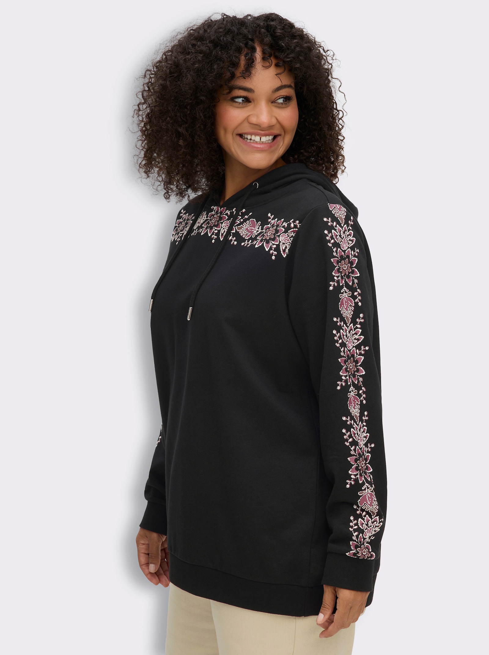 sheego Kapuzensweatshirt mit Blumenprint - schwarz-malve-bedruckt