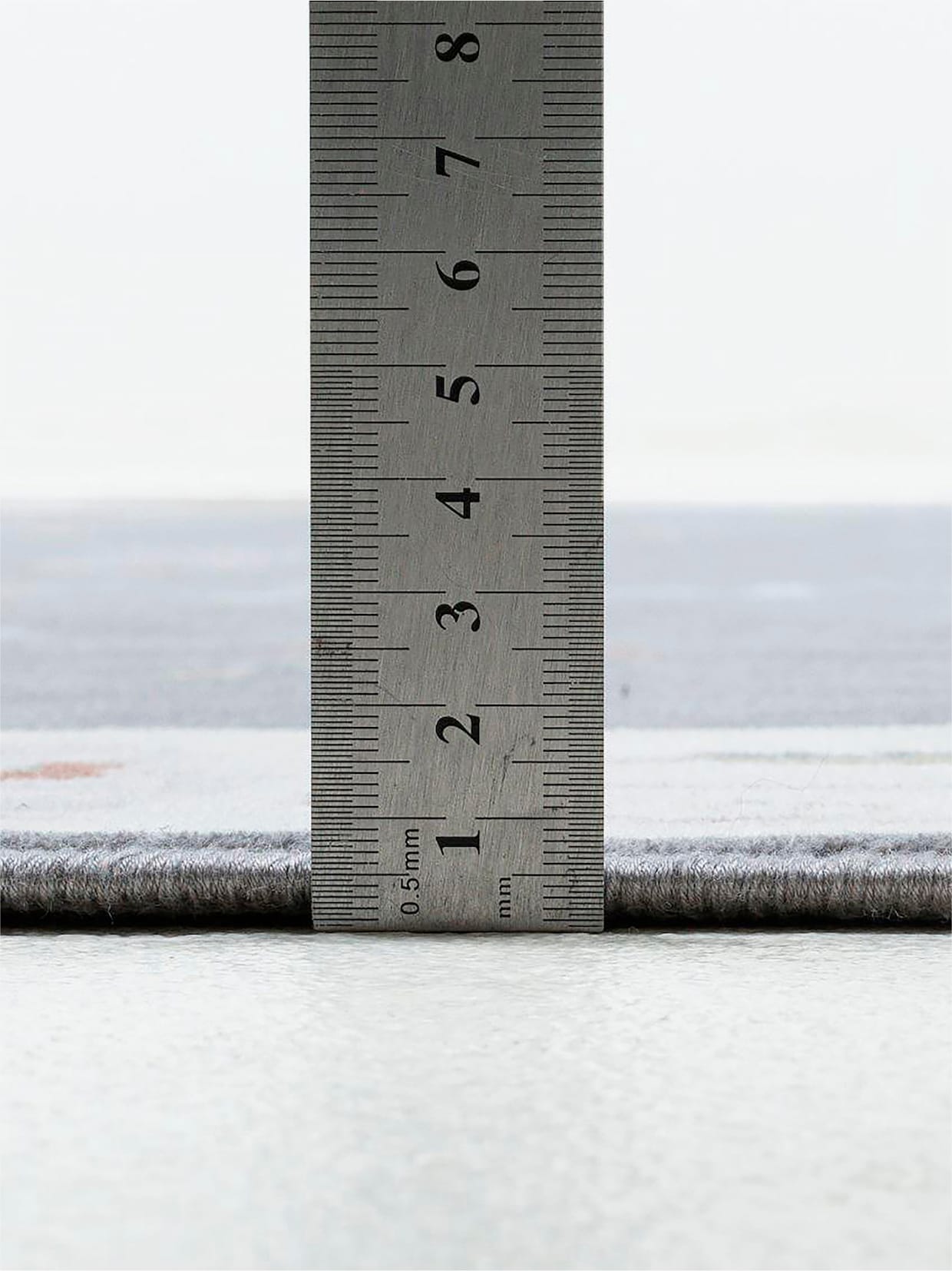 Theko Teppich - grau