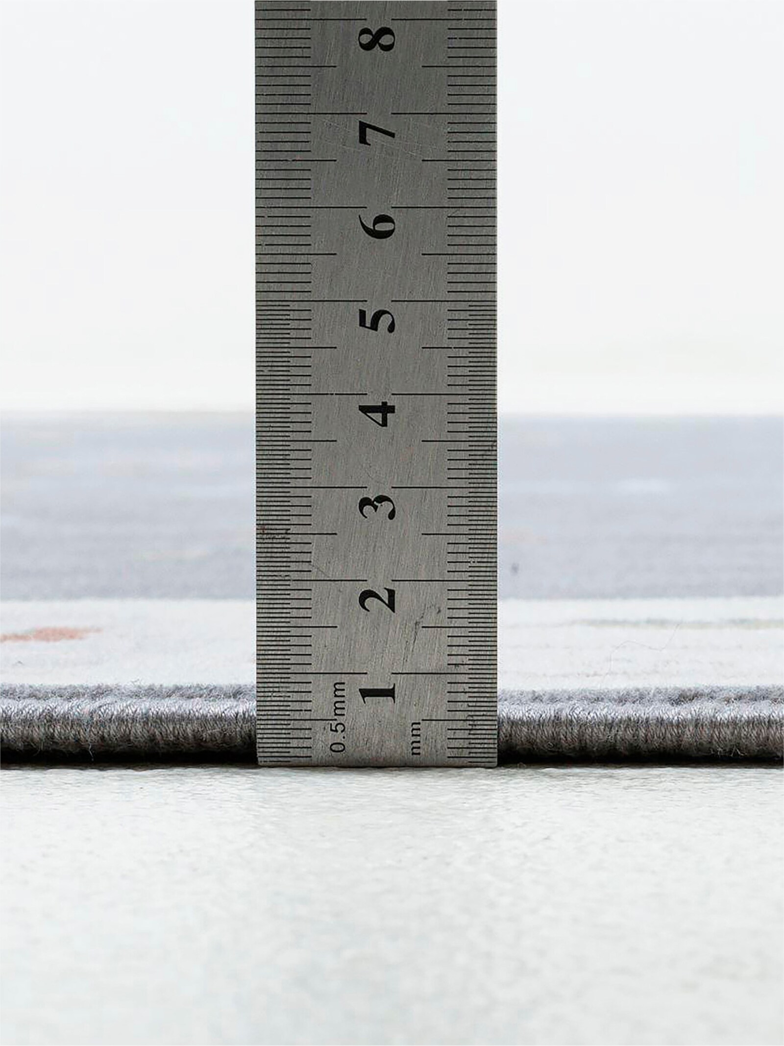 Theko Teppich - grau