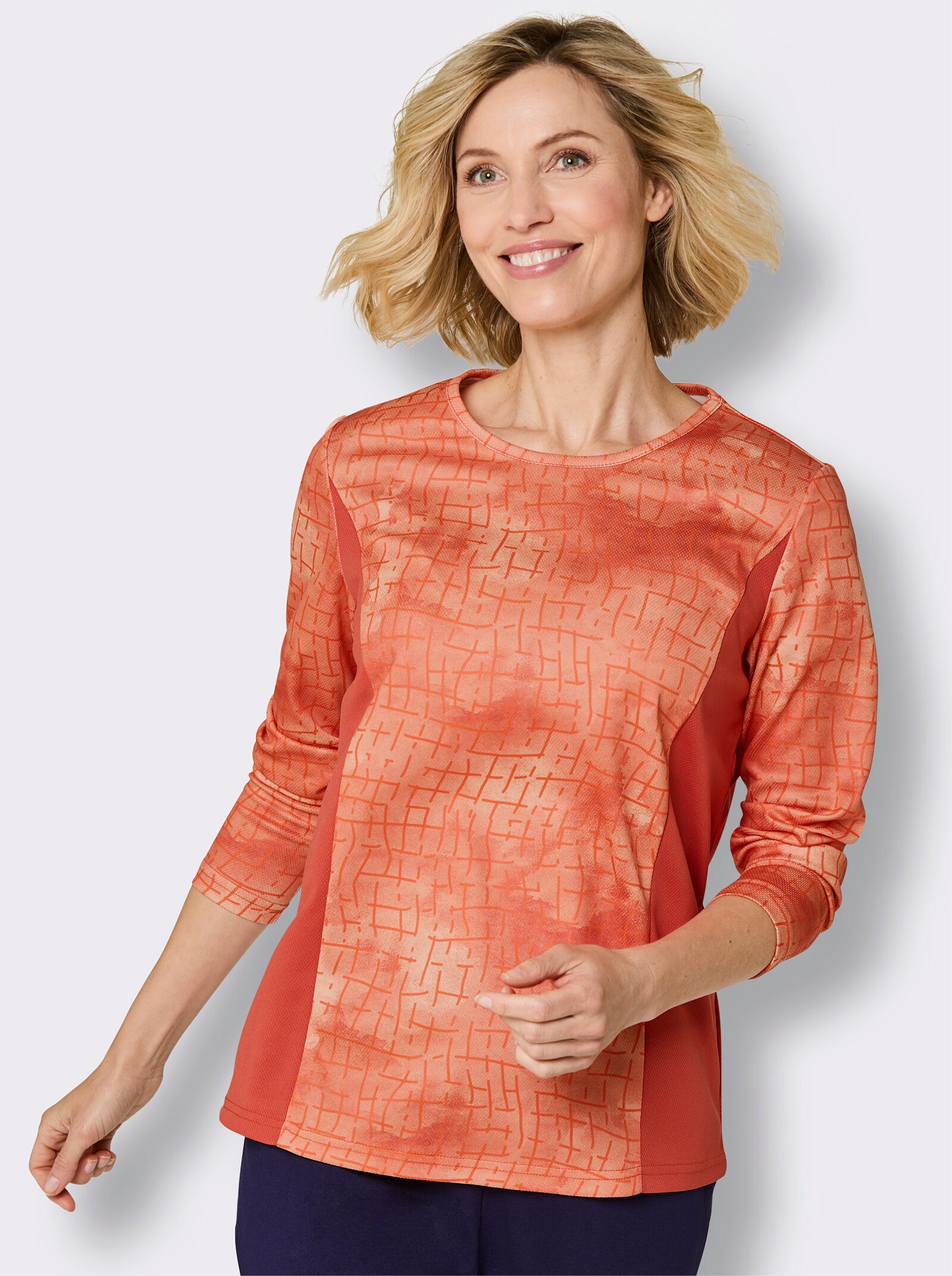 Funktionsshirt mit einfarbigen Seitenpartien - orange-gemustert