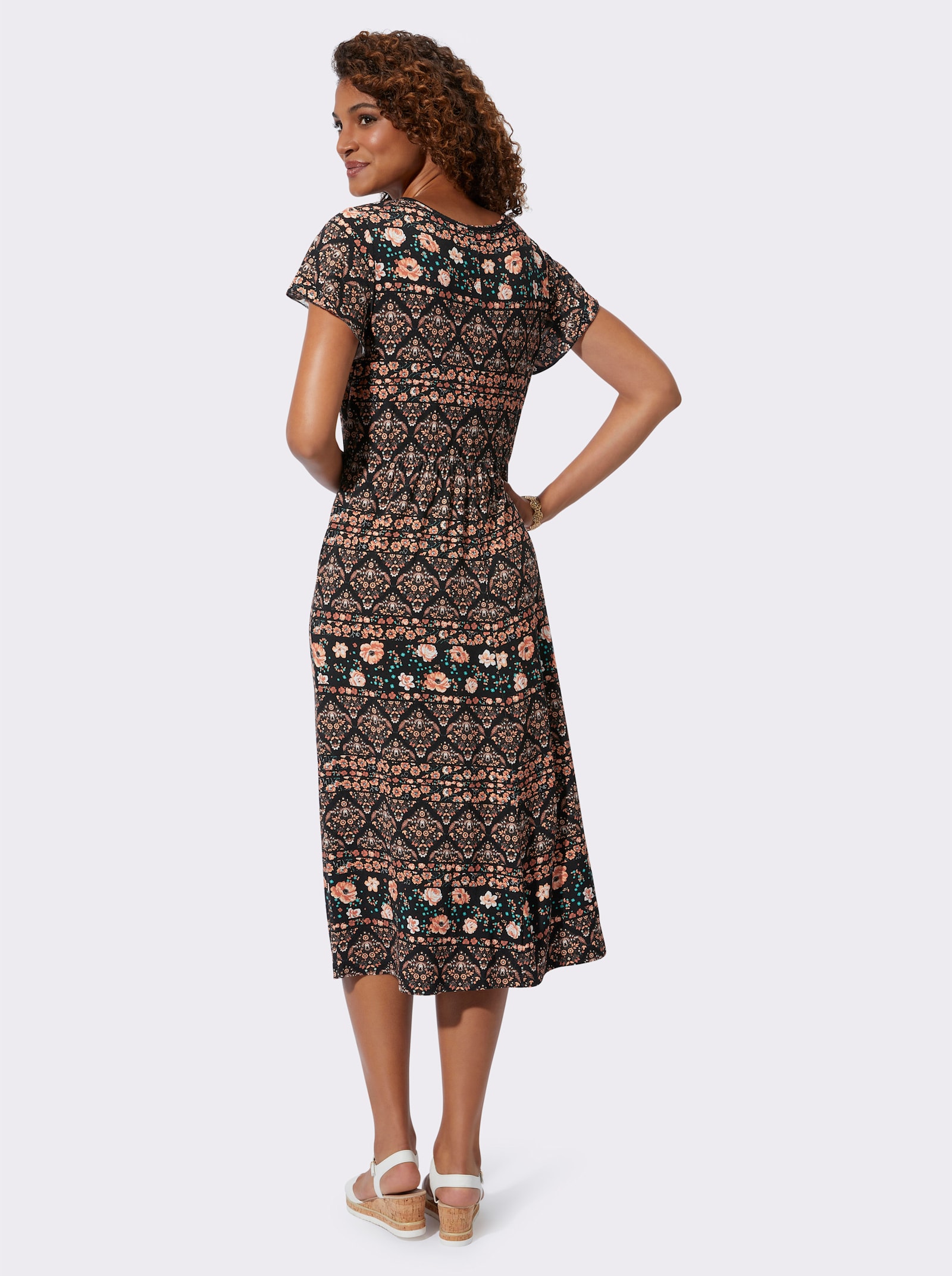 Jerseyjurk met elastiek op taillehoogte - papaja/zwart bedrukt