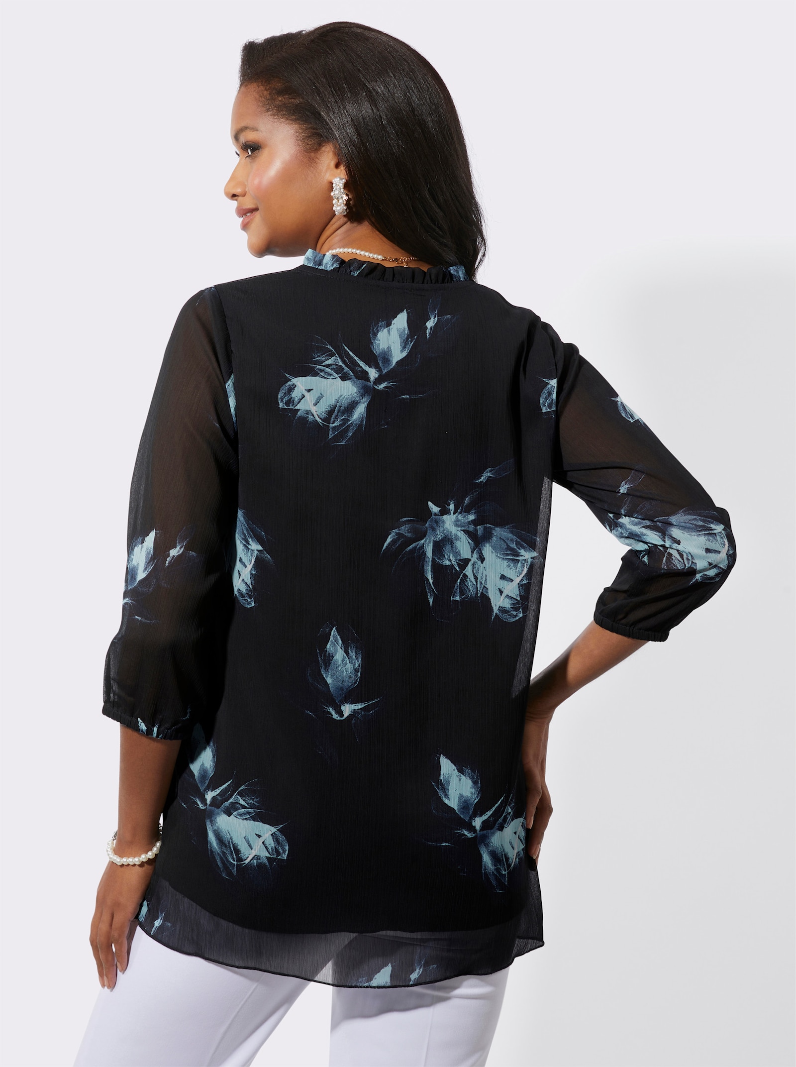 Tunika s riasením na výstrihu. - Čierno-akvamarínová potlač