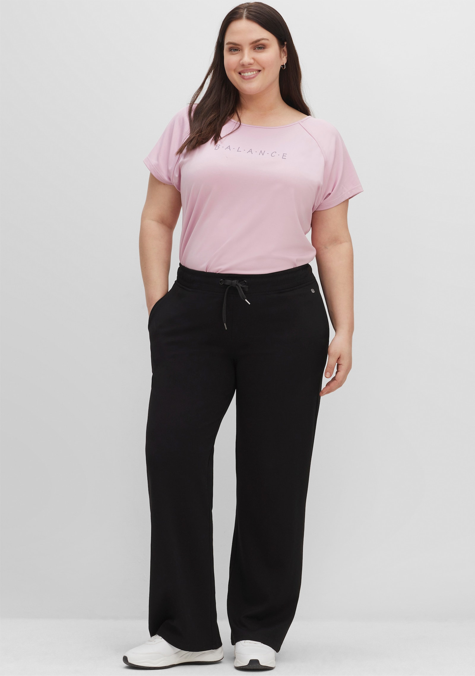 sheego Sportbroek in wijd model - zwart