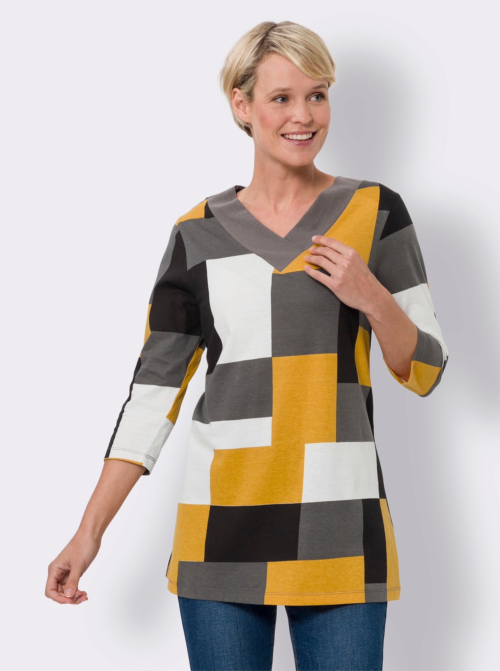 Lang shirt in A-lijn - zwart/oker bedrukt