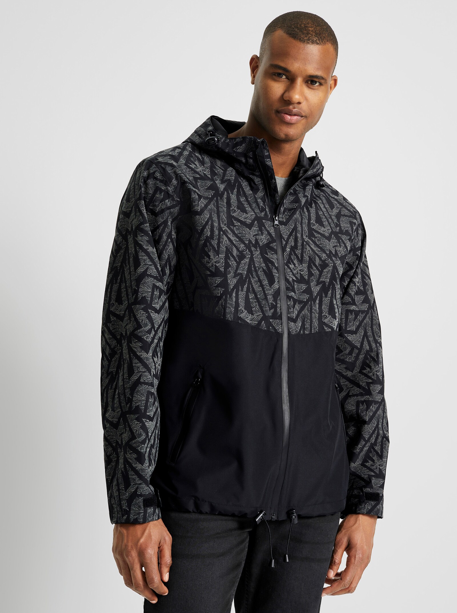 Catamaran Sports Sportjack met in wijdte verstelbare capuchon, mouwen en zoom - zwart gedessineerd