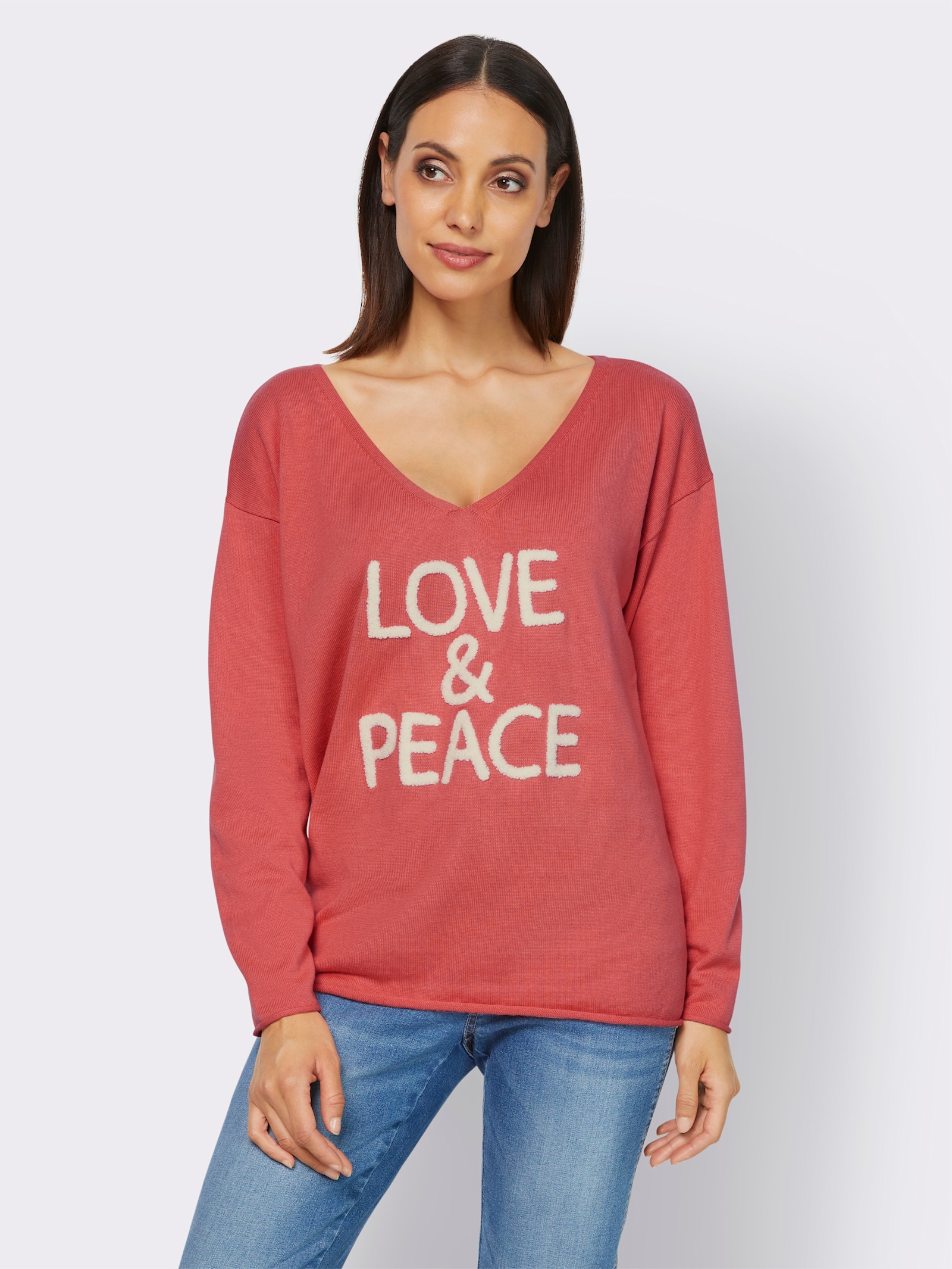 heine V-Ausschnitt-Pullover mit Flauschgarn-Schriftzug - koralle-bedruckt