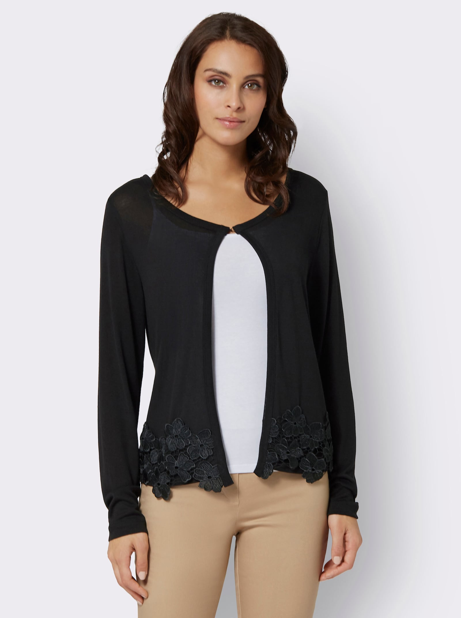 Shirtjacke mit Blütenspitze am Saum - schwarz