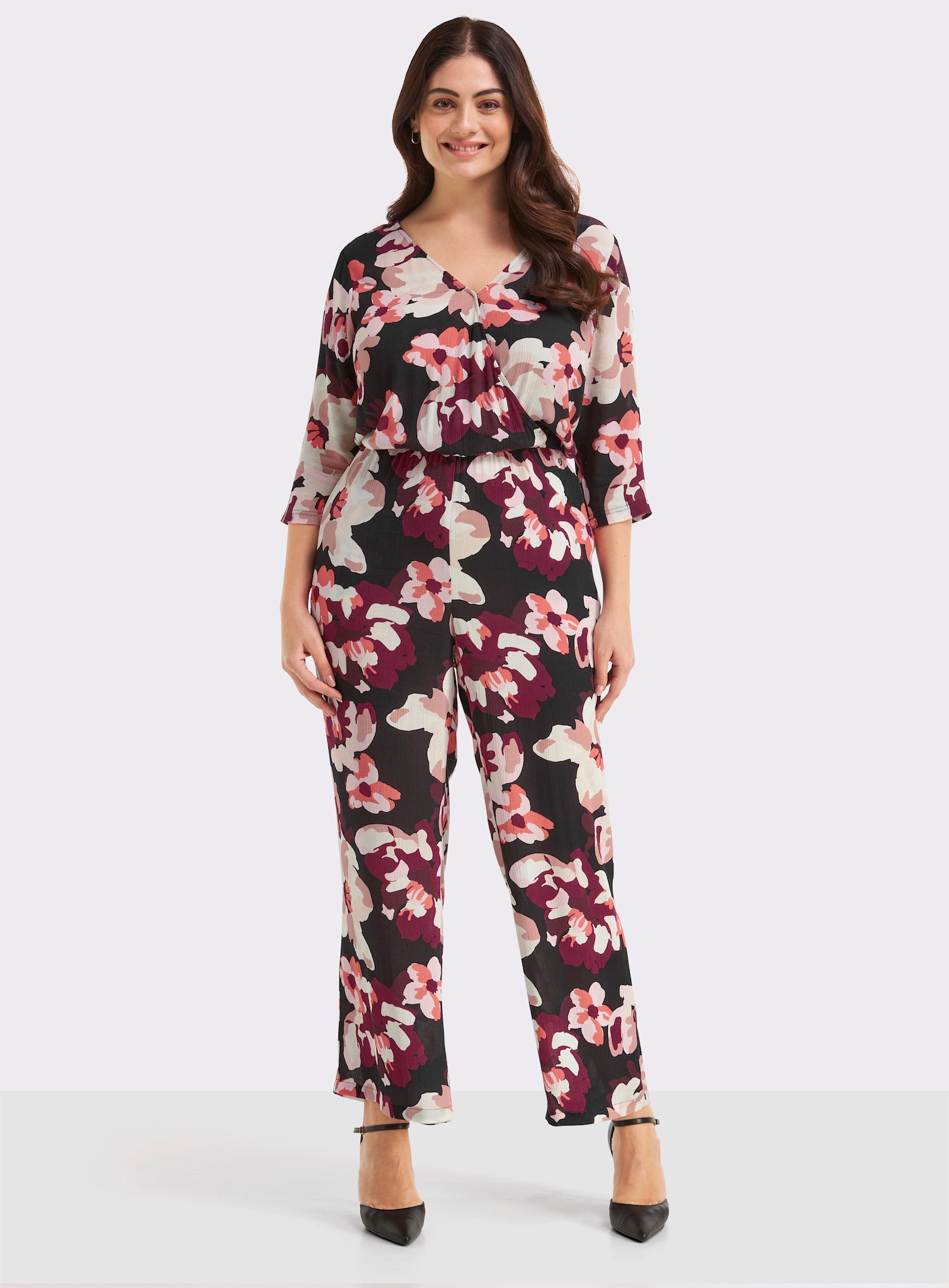 sheego Jumpsuit mit Blumenprint - schwarz-koralle-bedruckt
