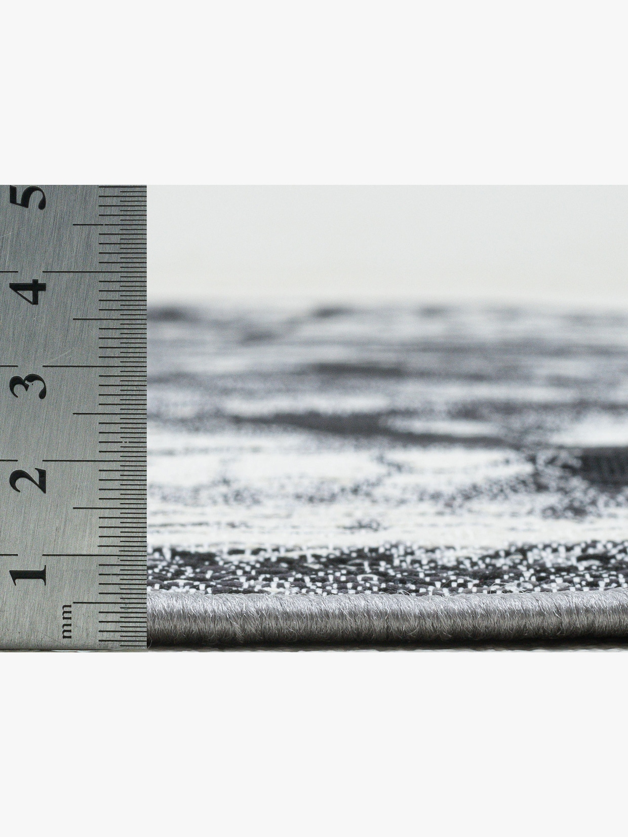 Theko Teppich - grau-gemustert