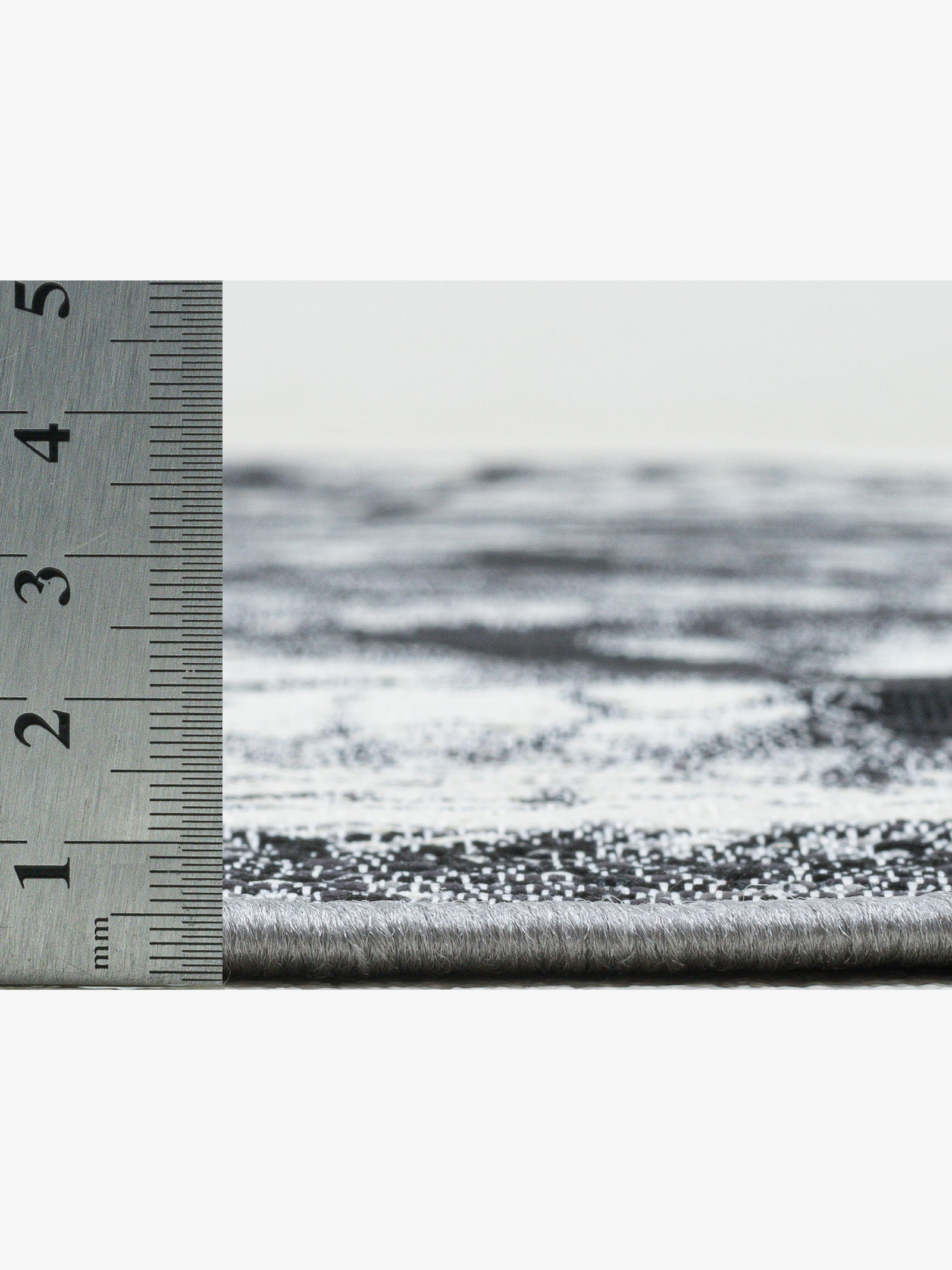 Theko Teppich - grau-gemustert