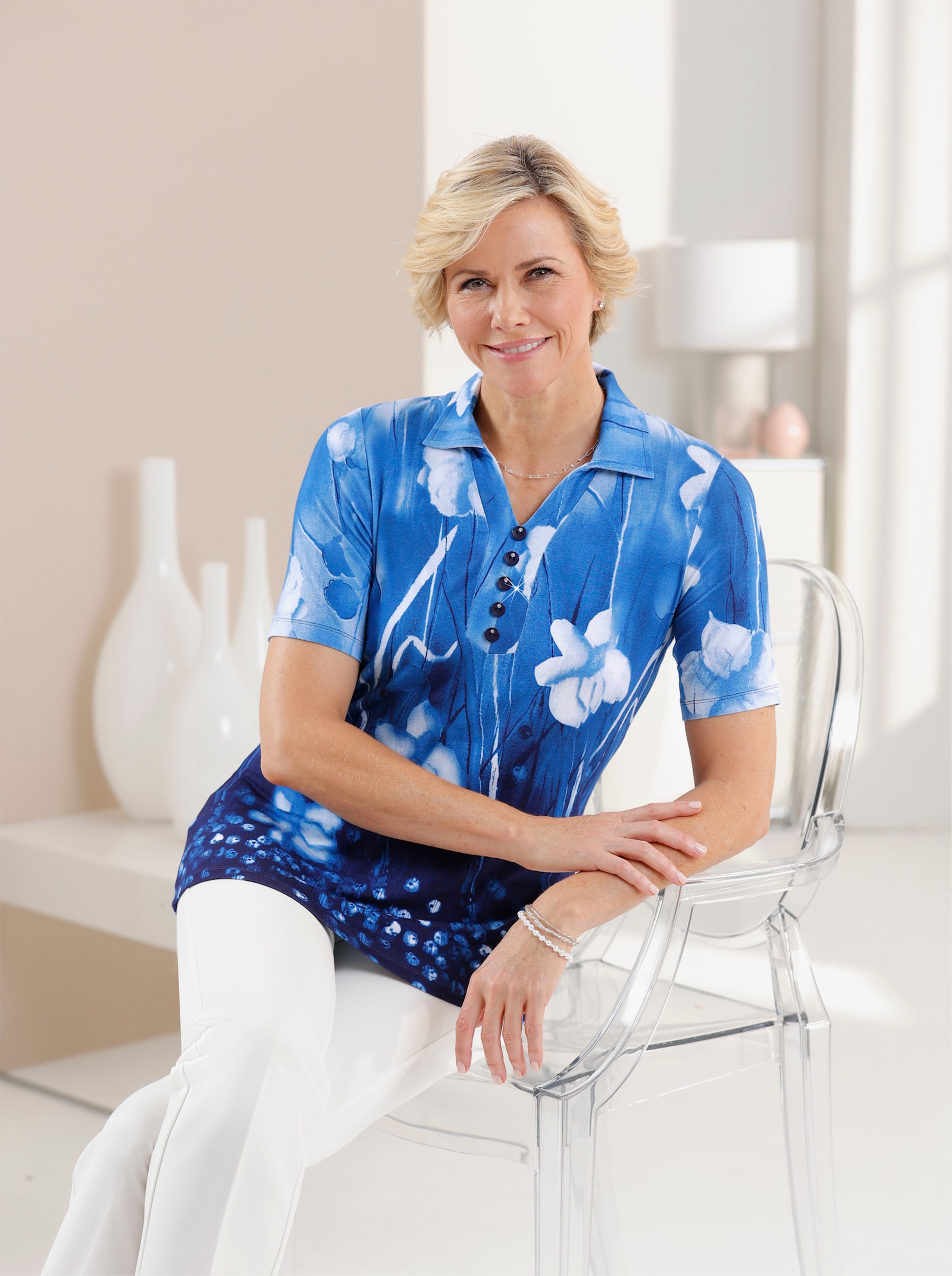 Poloshirt met bloemenprint - middenblauw/ecru bedrukt