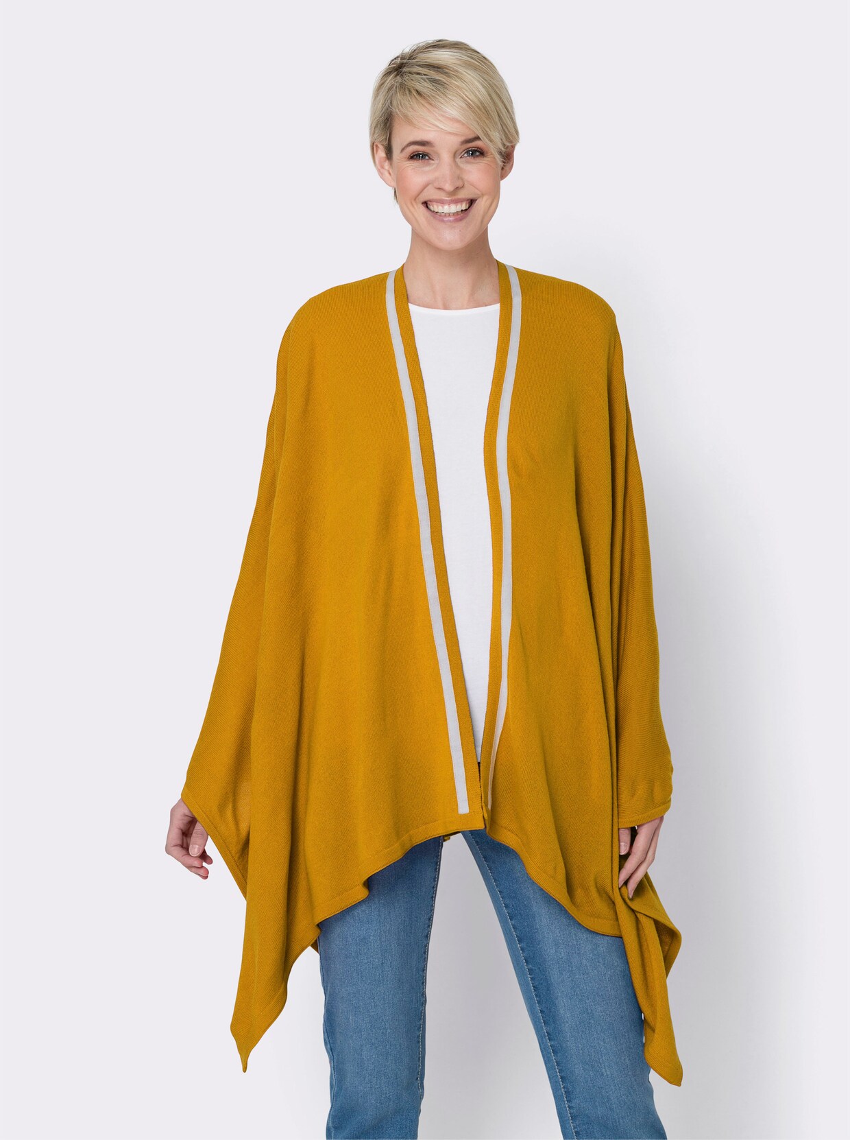 Gebreide cape - oker/wit