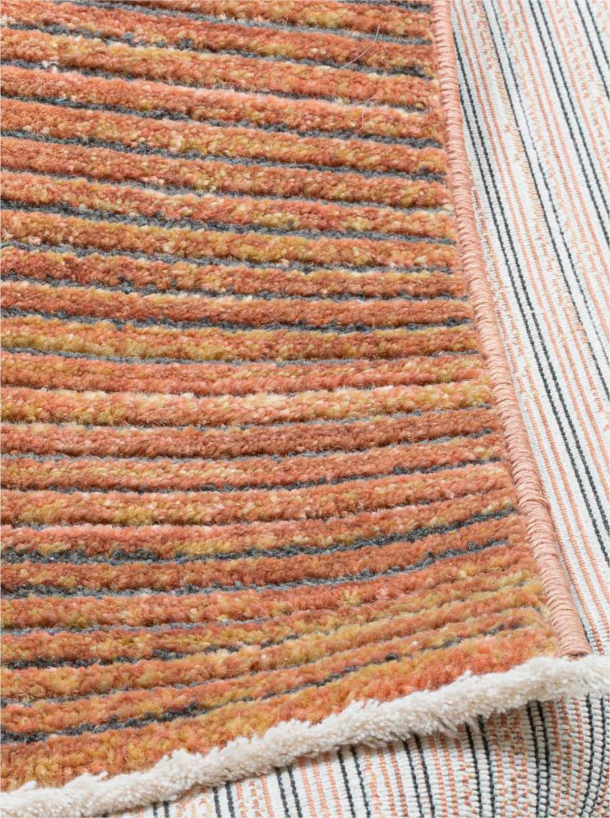 Theko Teppich - rost-meliert