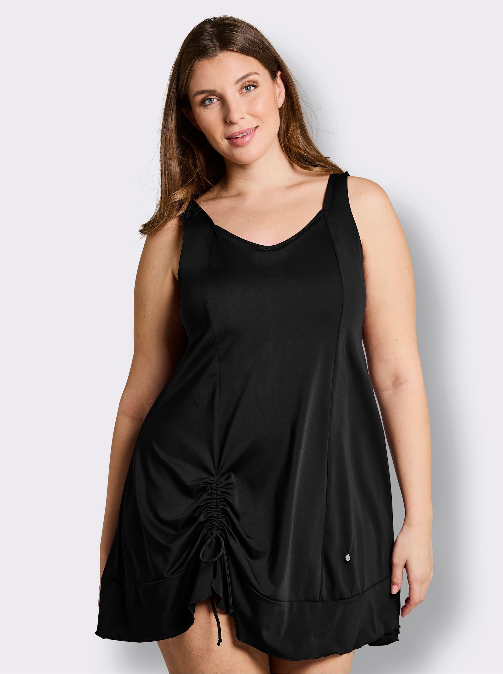 sheego Badekleid mit Raffung am Saum - schwarz