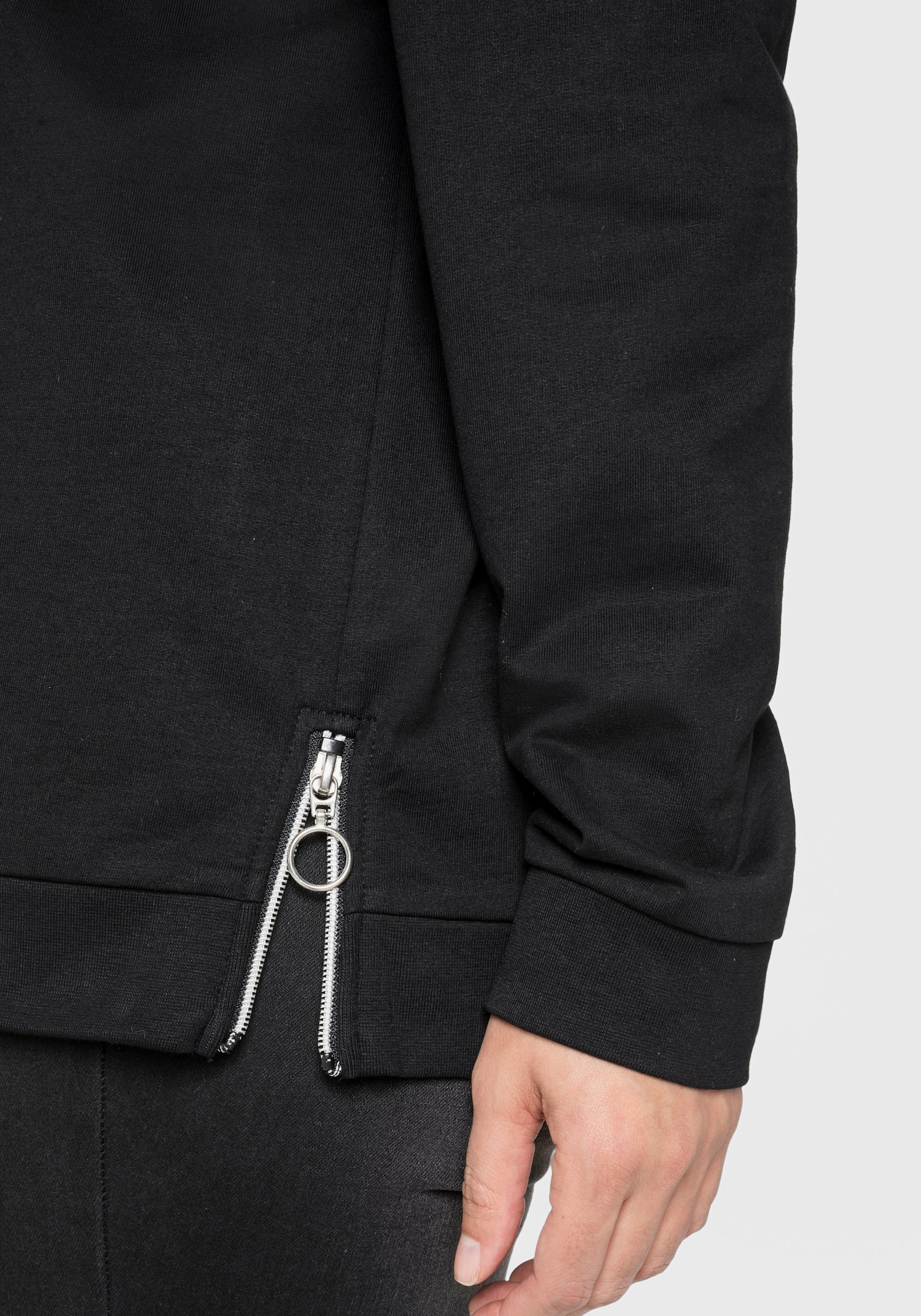 sheego Sweatshirt mit seitlichen Zippern - schwarz