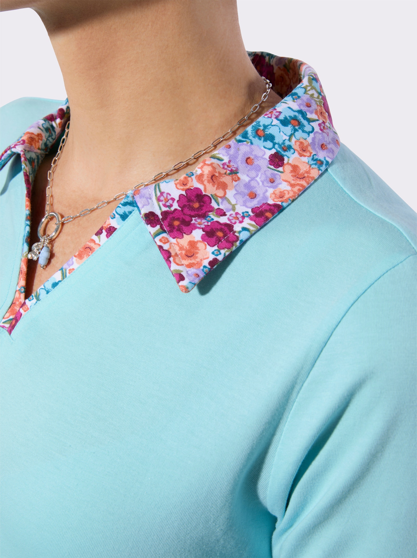 Poloshirt mit vielen Details - aquamarin