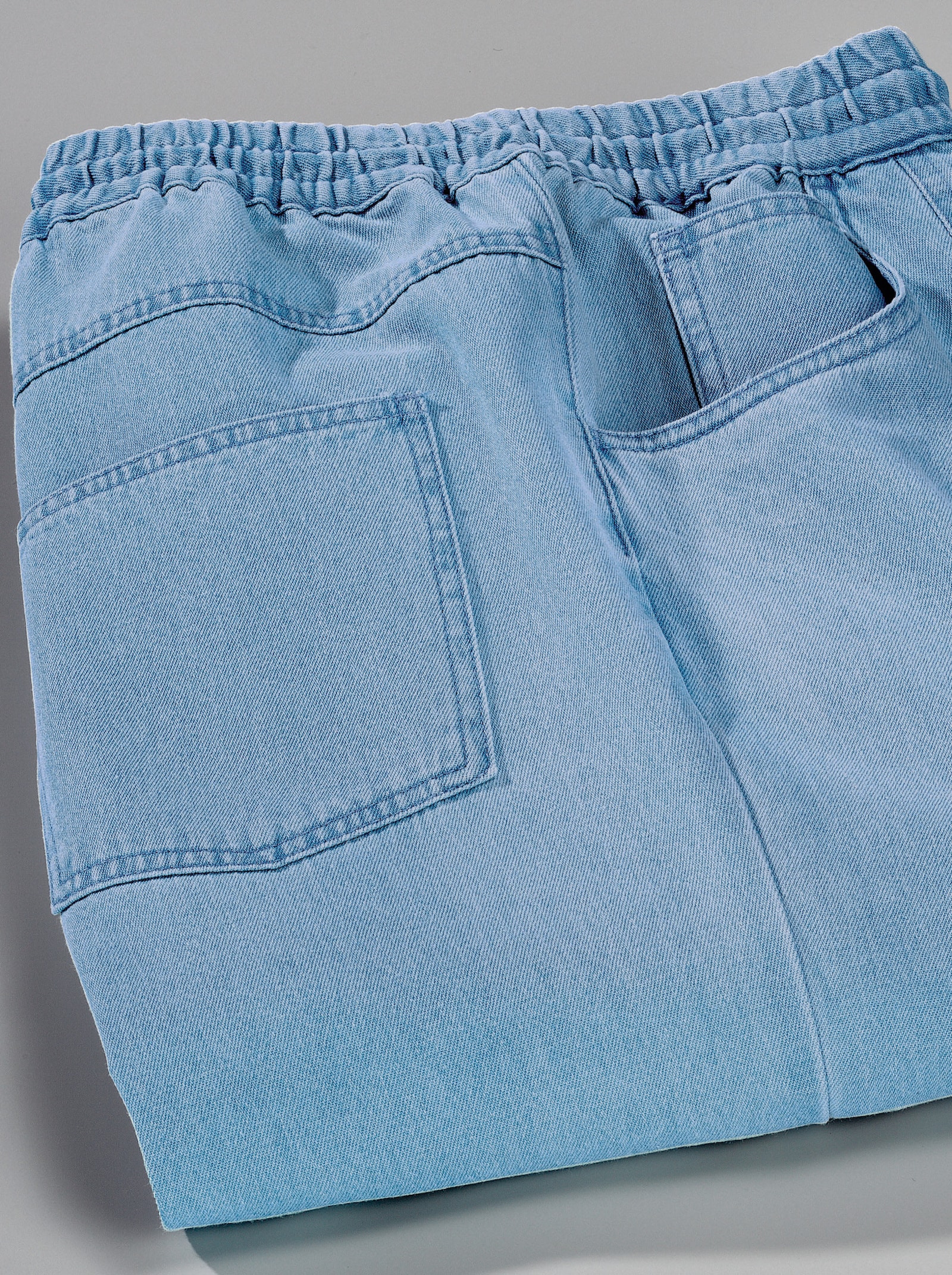 Navlékací kalhoty s cargo kapsami - bělená modrá