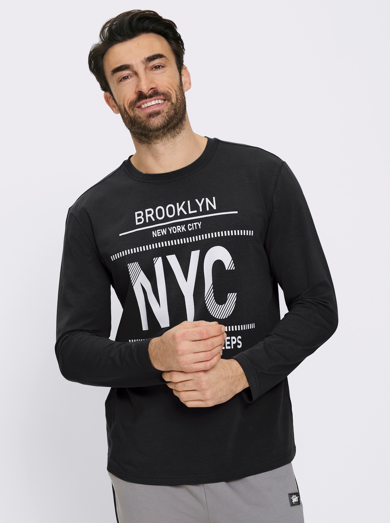 Catamaran Sports Freizeitshirt mit platziertem Druck - schwarz-weiß-bedruckt