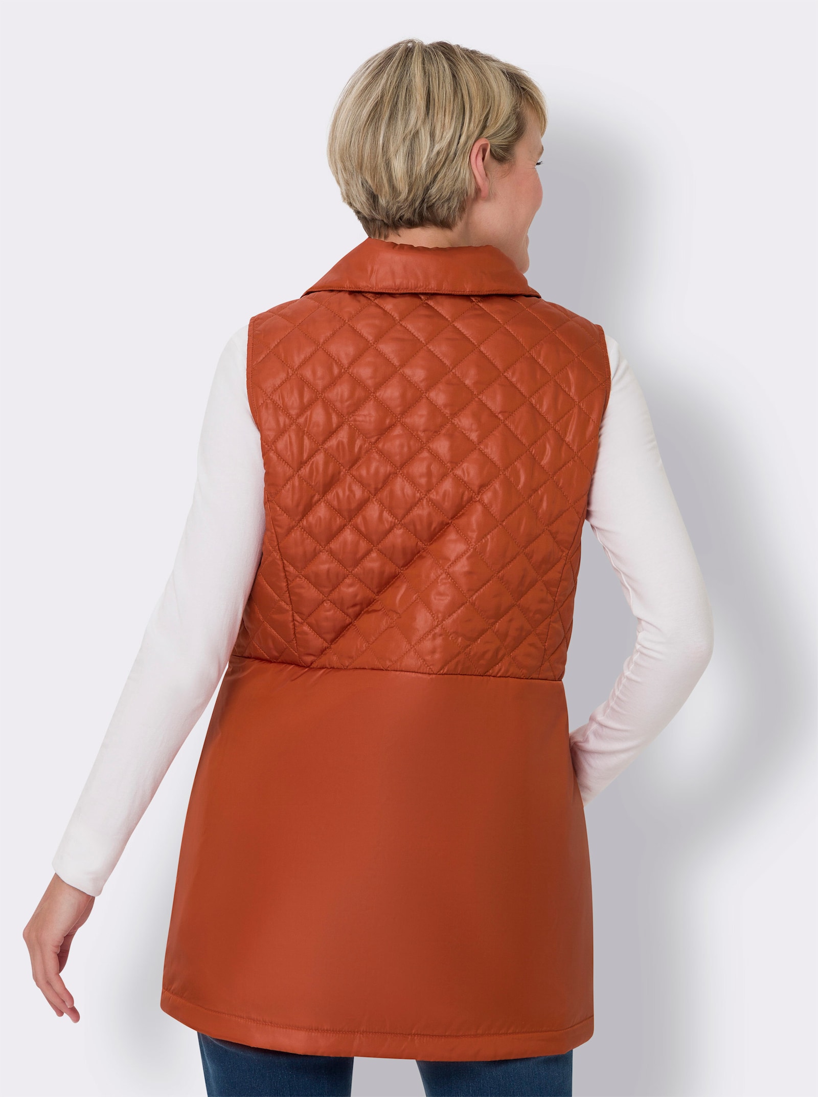 Lange bodywarmer met ruitstiksels - roestrood