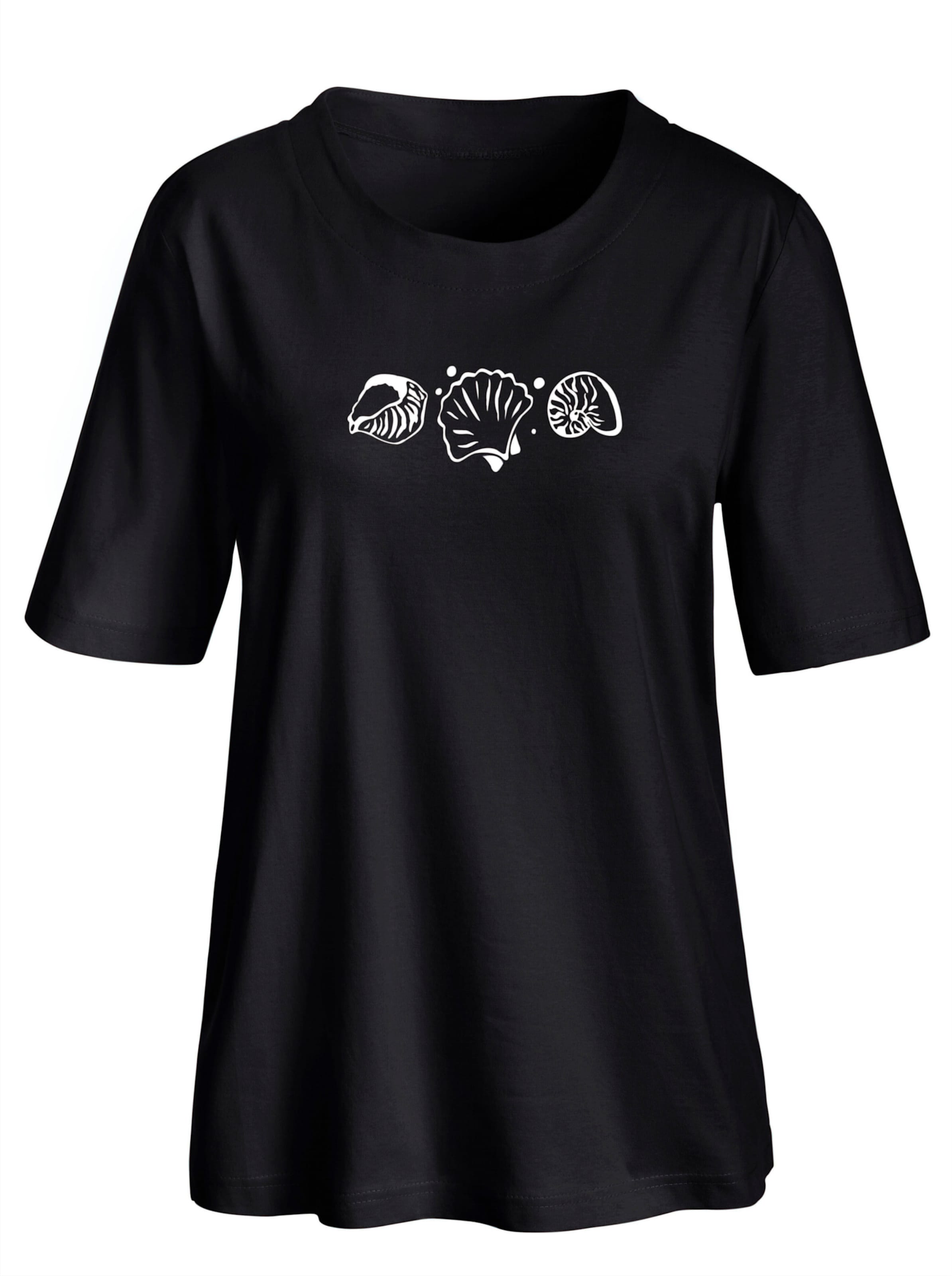 VORNE günstig Kaufen-Kurzarmshirt in schwarz von heine. Kurzarmshirt in schwarz von heine <![CDATA[Shirt mit Muscheldruck vorne. Seitenschlitze.]]>. 