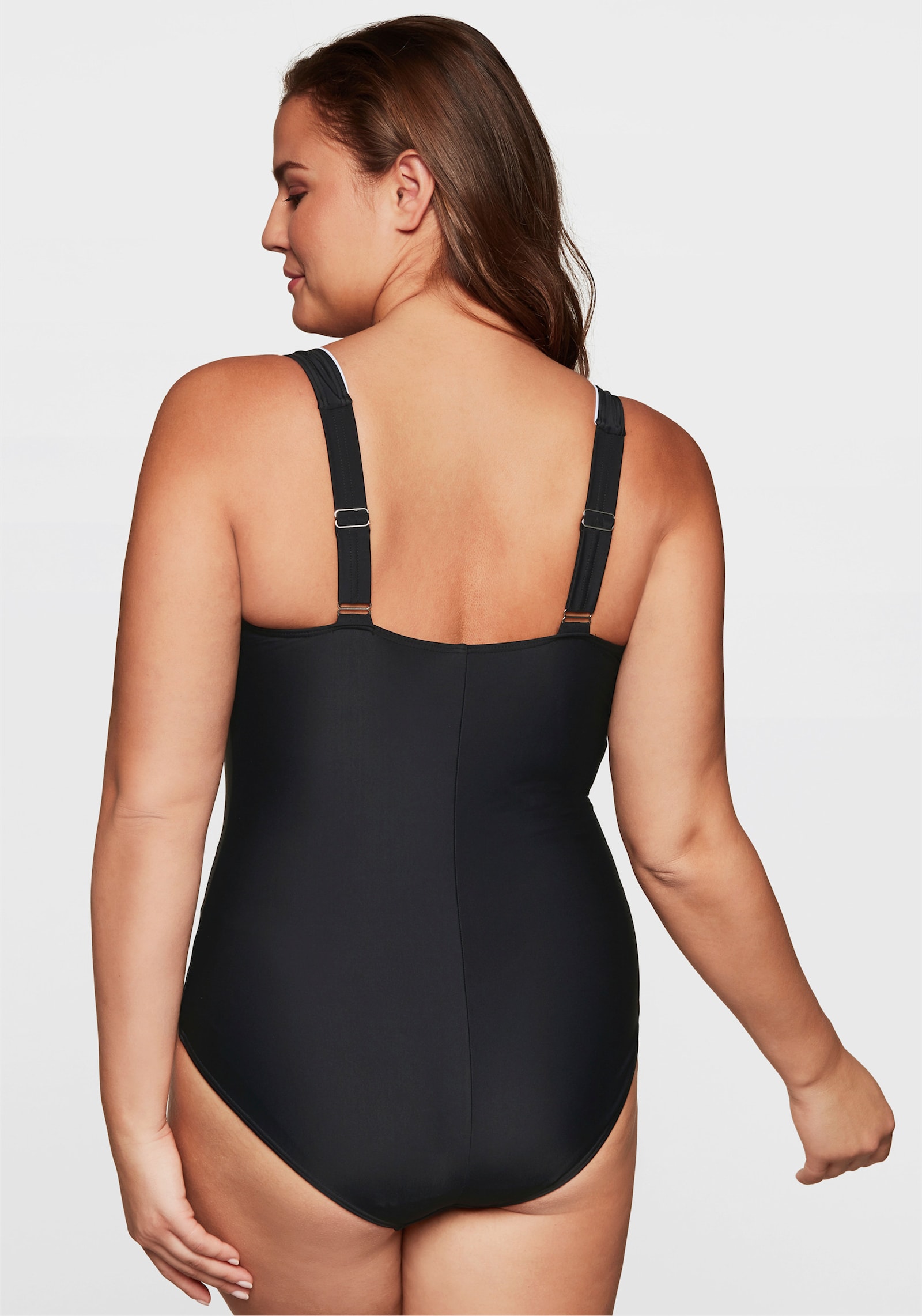 sheego Badeanzug mit Kontrastpaspeln und Shaping-Effekt - schwarz