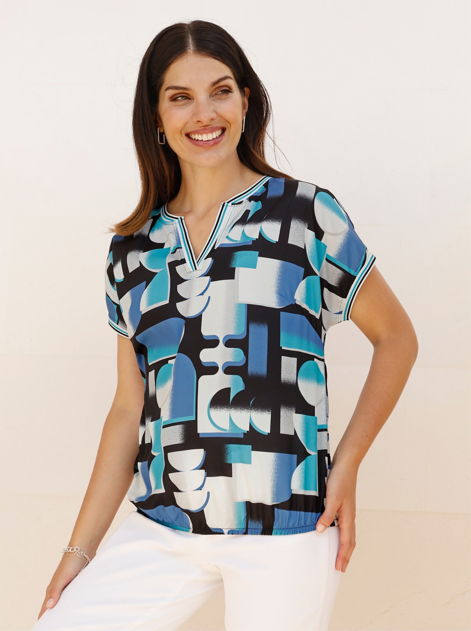 Schlupfbluse im Grafik-Dessin - türkis-schwarz-bedruckt