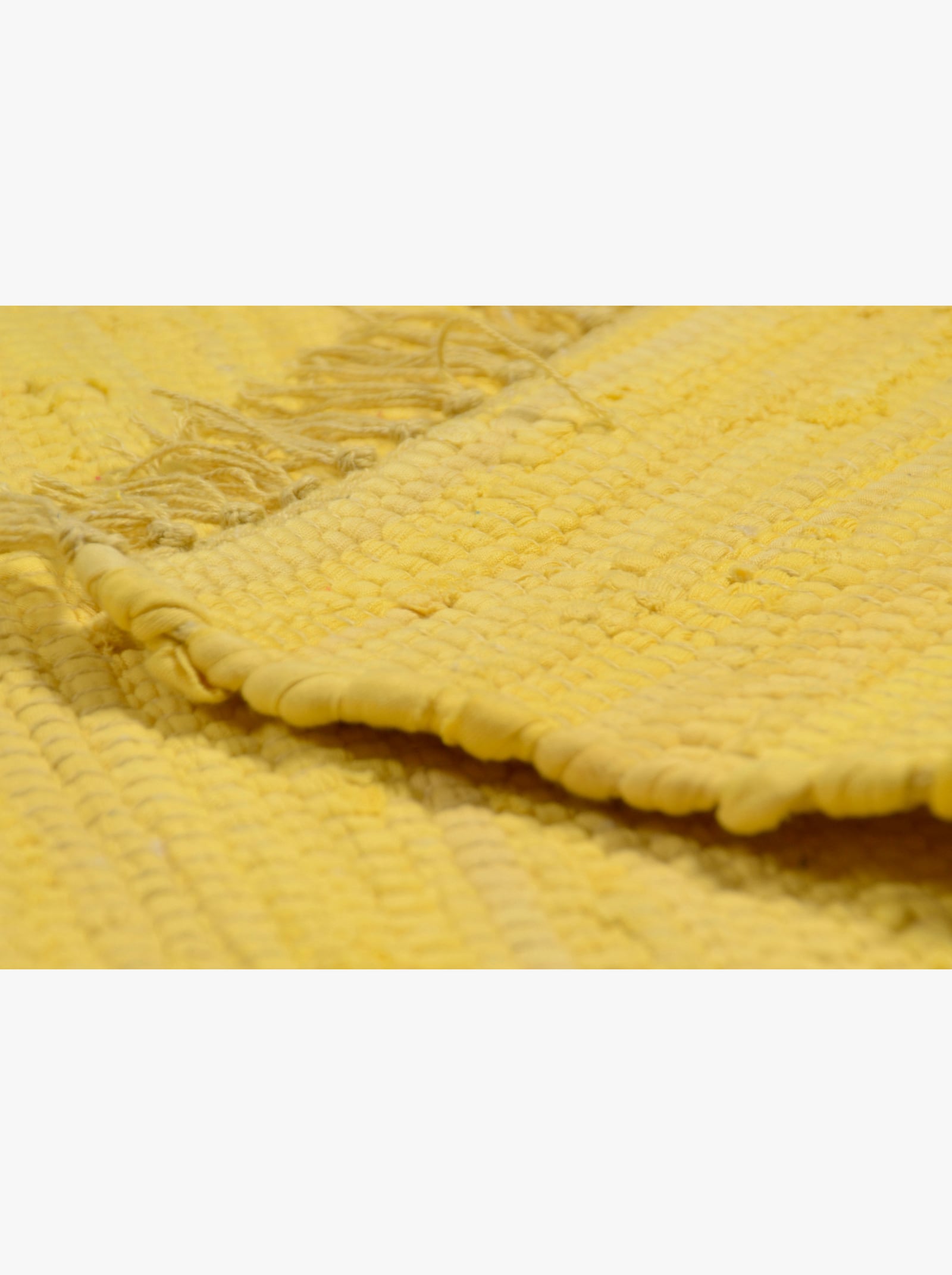 Theko Handwebteppich - gelb