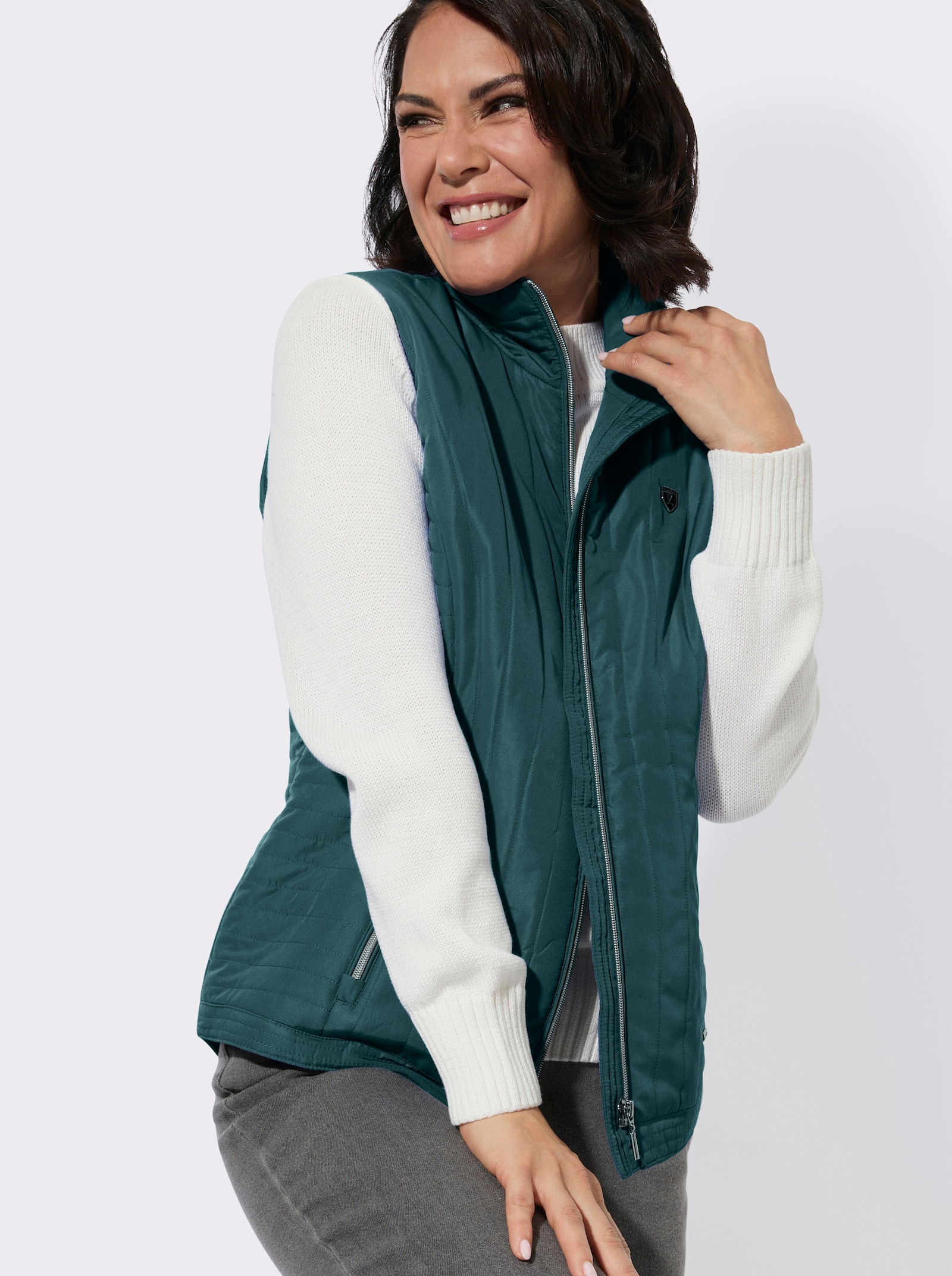 Steppweste mit Zippertaschen - petrol