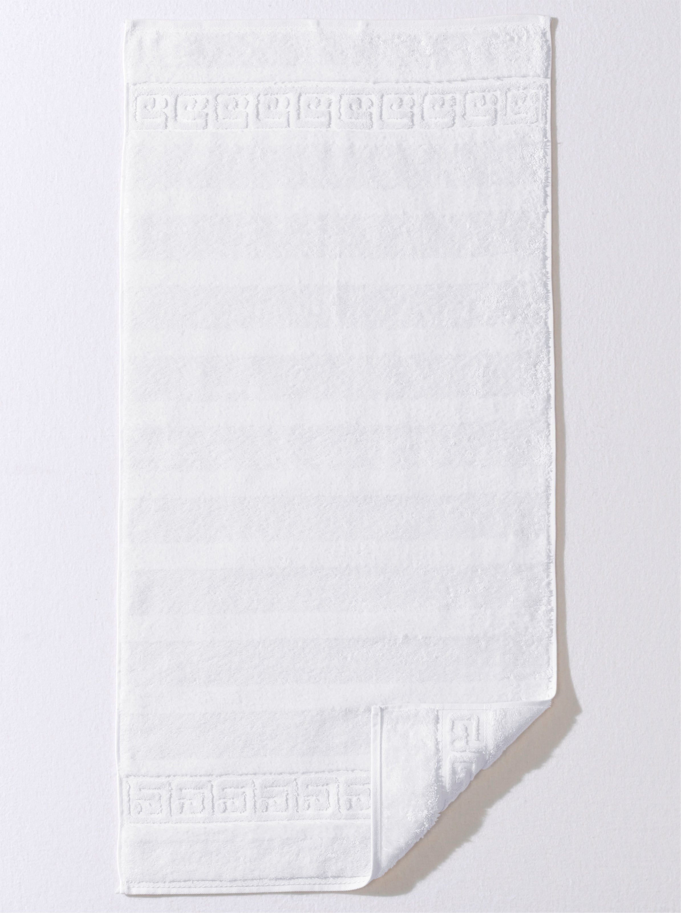 Walk On günstig Kaufen-Handtuch in weiß von Cawö. Handtuch in weiß von Cawö <![CDATA[Handtuch-Programm mit eleganter Mäanderborte und dezenten Veloursstreifen. Besonders langlebige und saugstarke Walkfrottier-Qualität.]]>. 