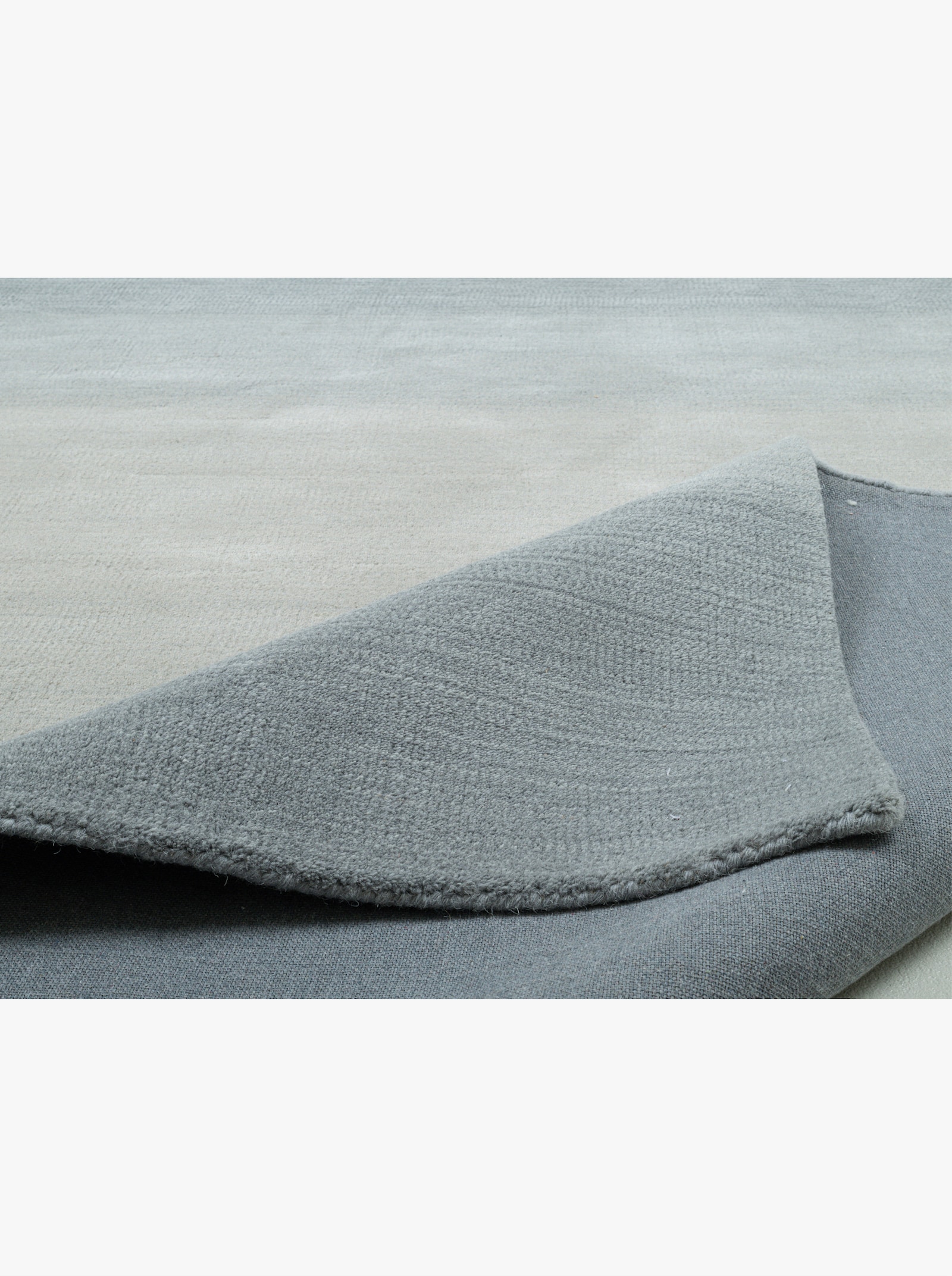 Theko Handwebteppich - grau