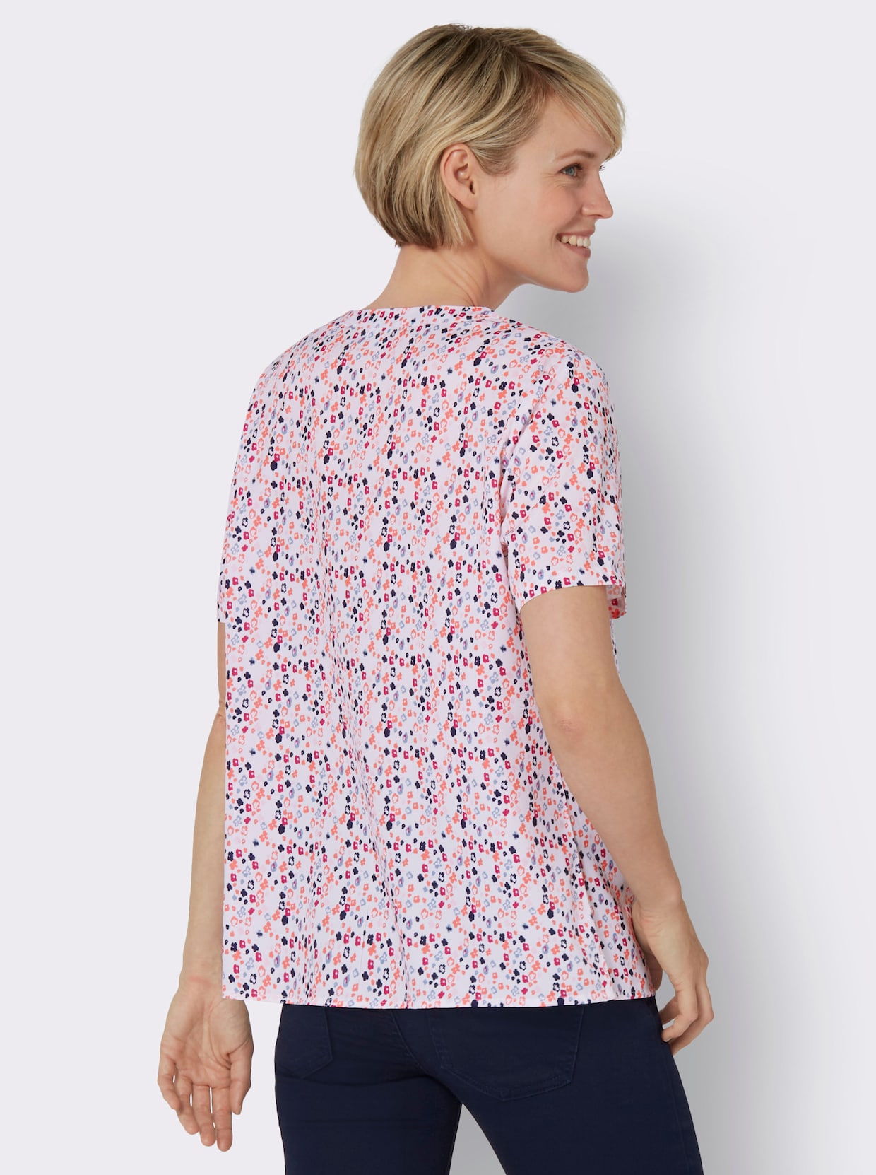 Comfortabele blouse - wit/koraal bedrukt