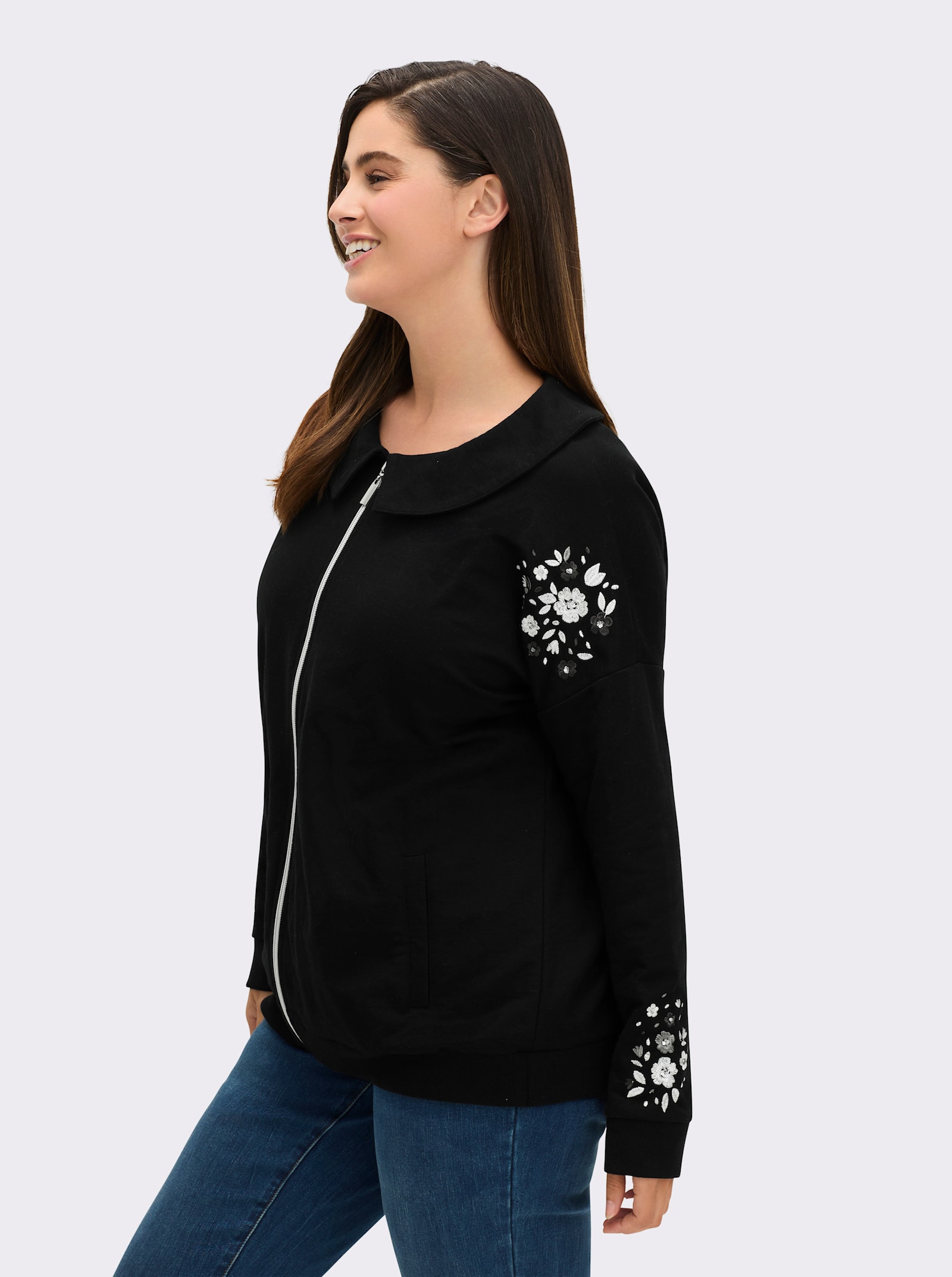 sheego Sweatjacke mit Glitzer-Blumendruck - schwarz